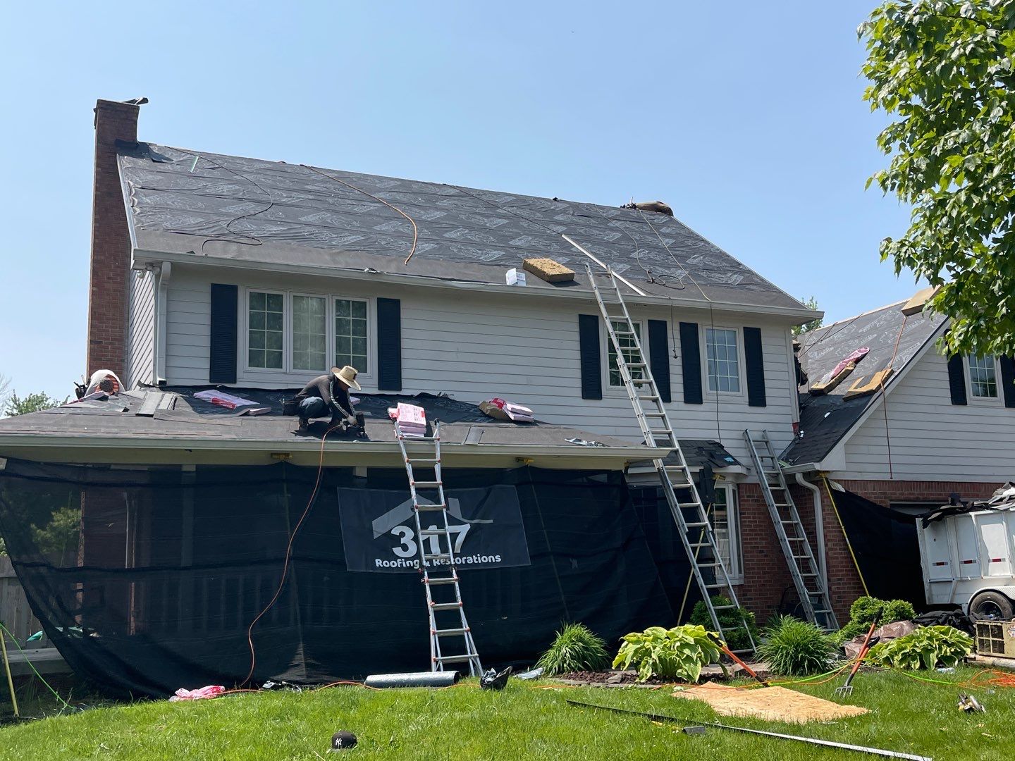 Tornado damage in Whiteland. Roof replacement, James Hardie siding, exterior paint, gutters, windows, doors by 317 Roofing & Restorations