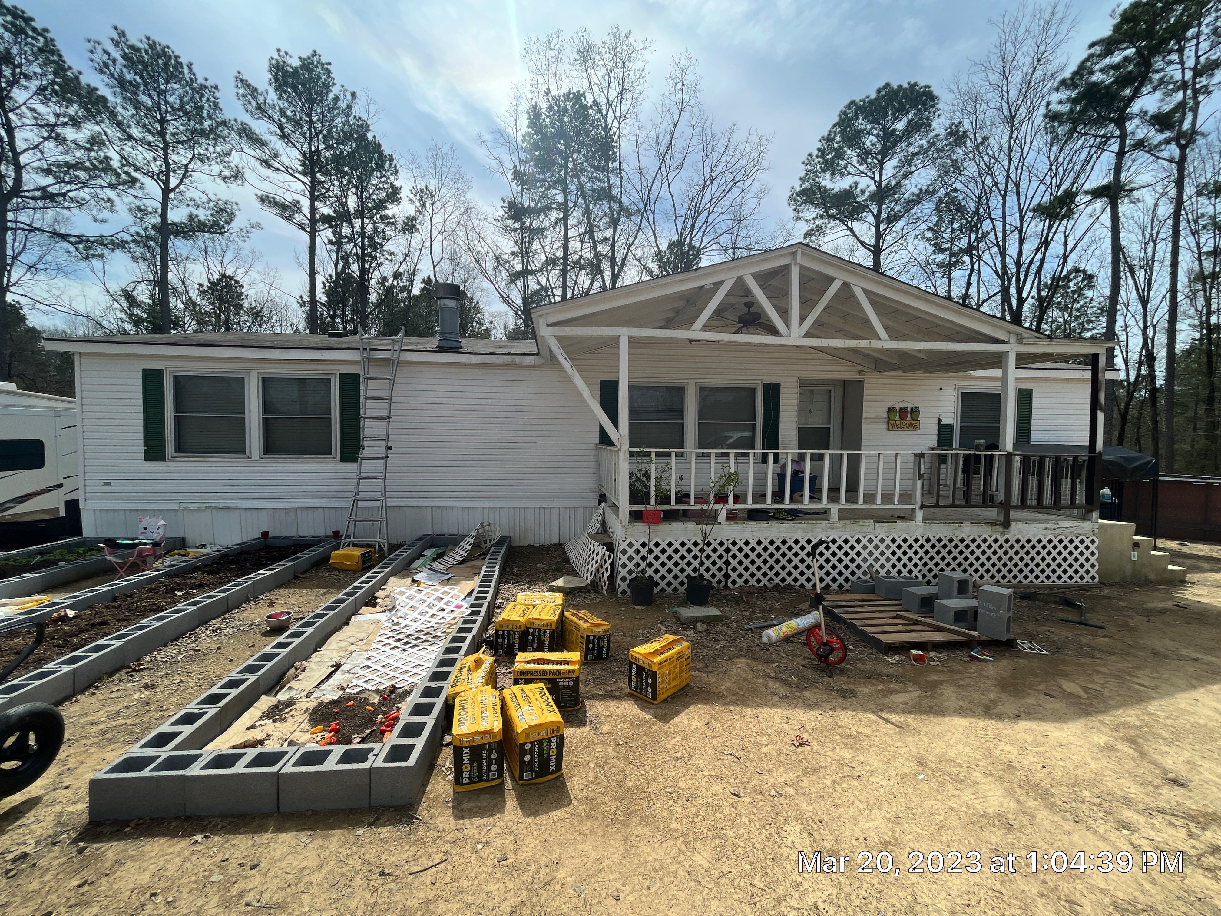 Residential Roofing Installation using 26 Gauge Colored Panels by Hostetler Roofing