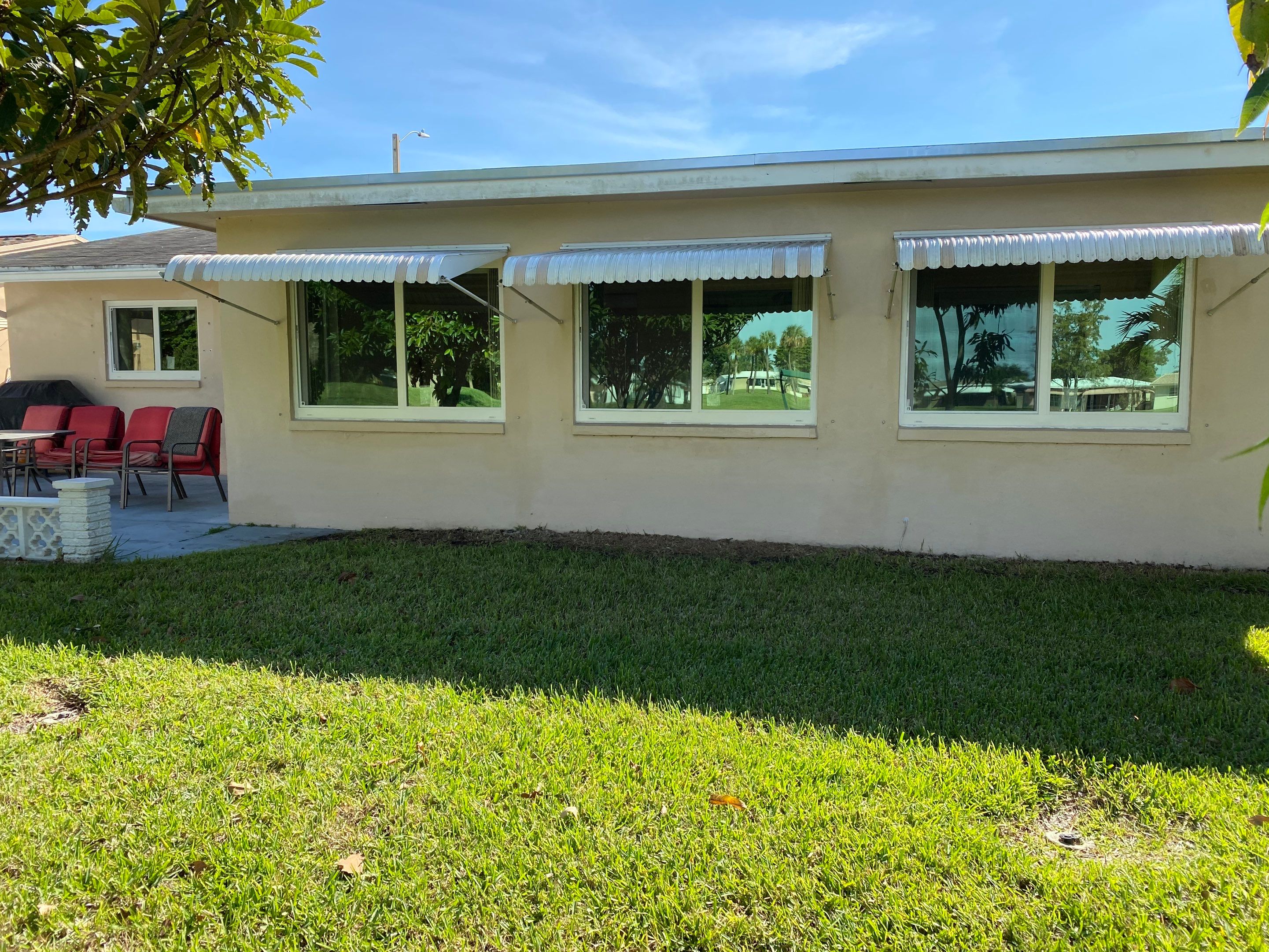 Tamarac Residential Entry Door and Aluminum Window Installation Project by The Door Doctor of South Florida, Inc.