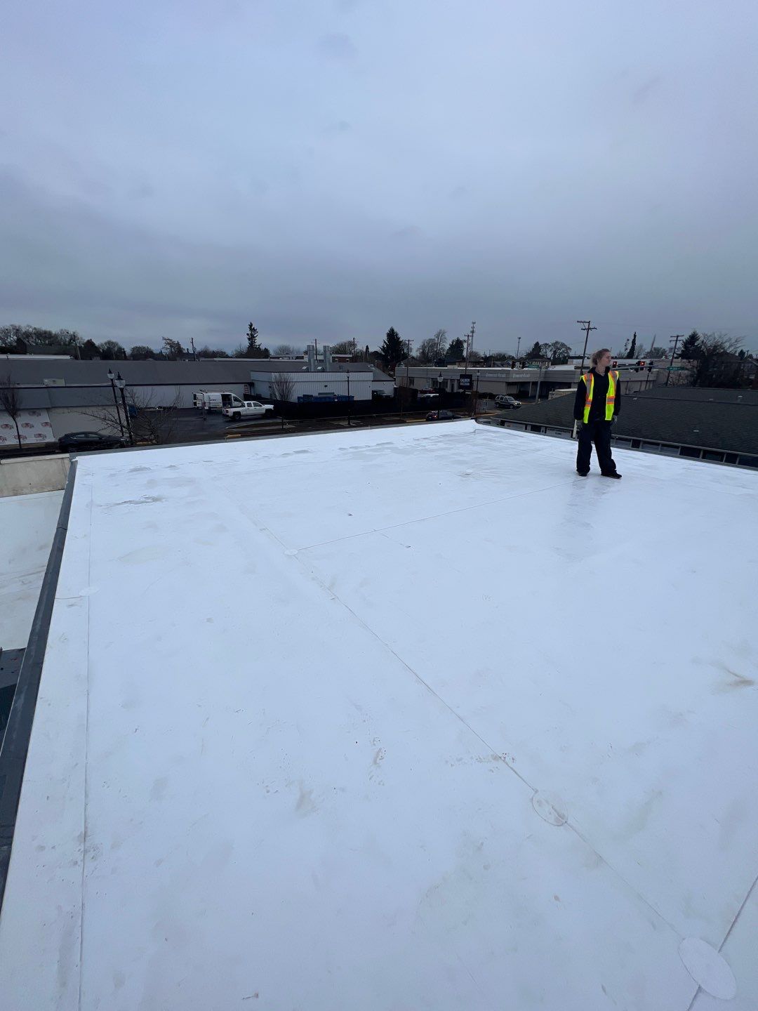 Commercial Flat Roof Installation using GAF 60Mil TPO  by Orezona Building & Roofing Company, Inc.