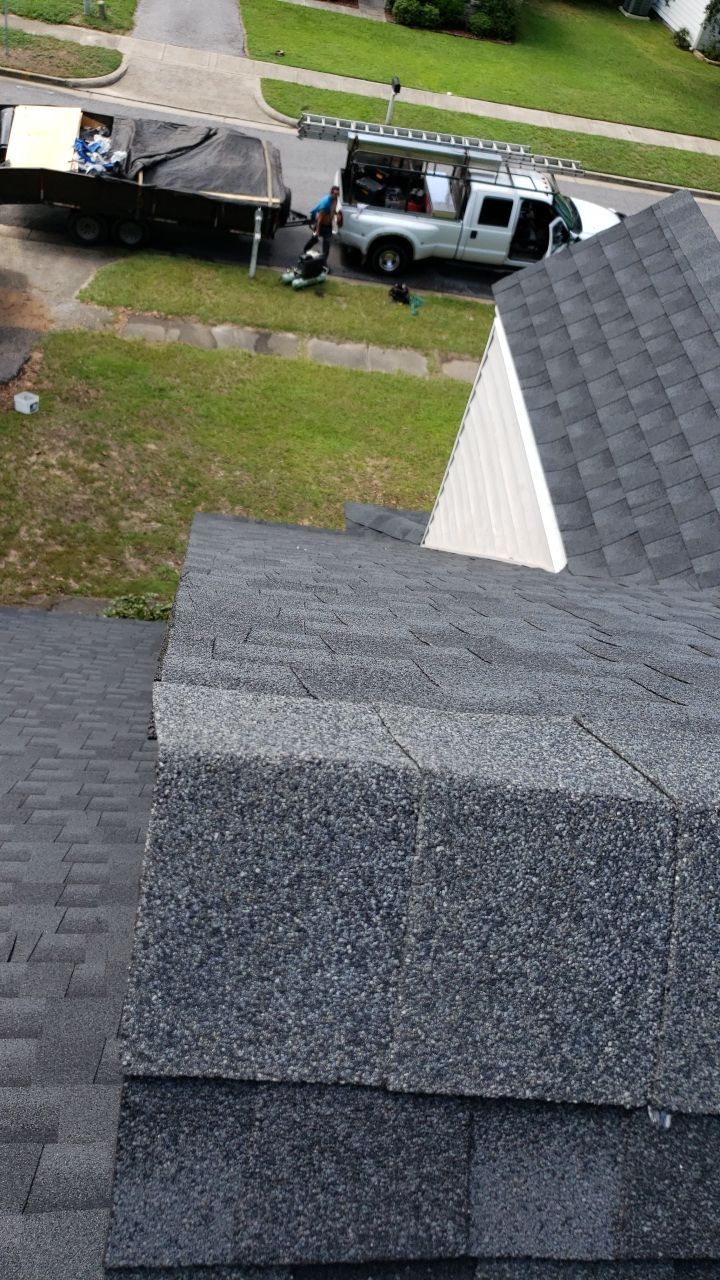 Residential Roofing Installation using Roof Replacement by American Roofing & Construction LLC