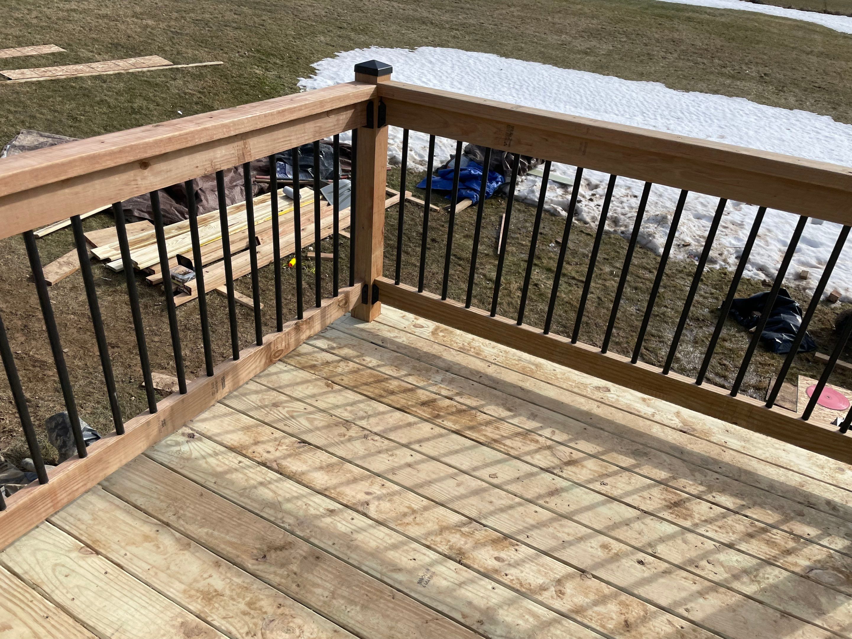 Deck Installation using Treated Lumber by Avalon Roofing and Exteriors
