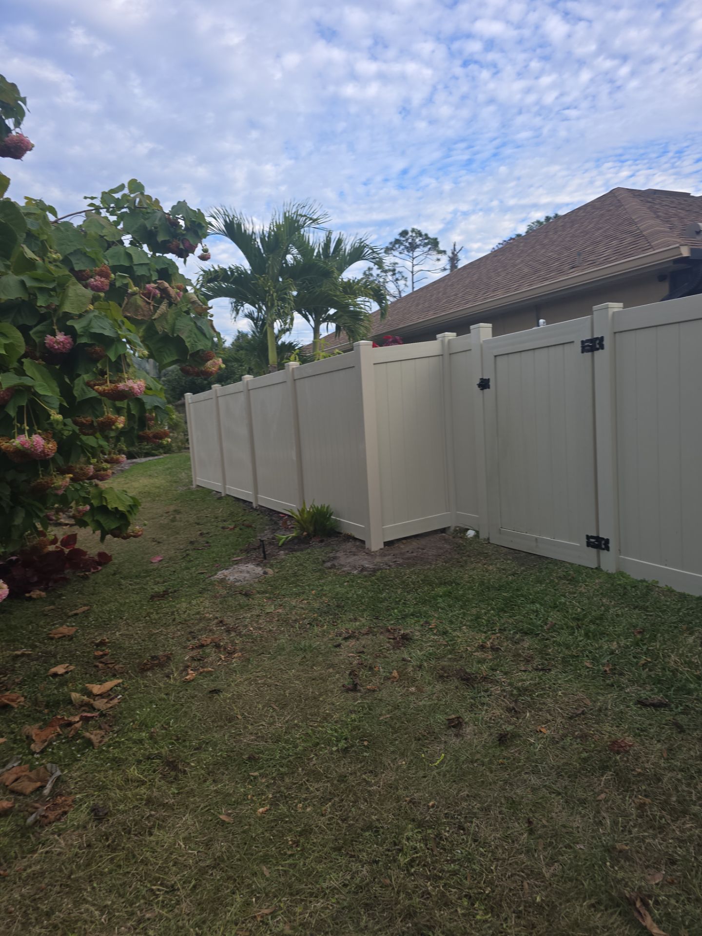 Tan Vinyl Fence in North Port by True Fence LLC