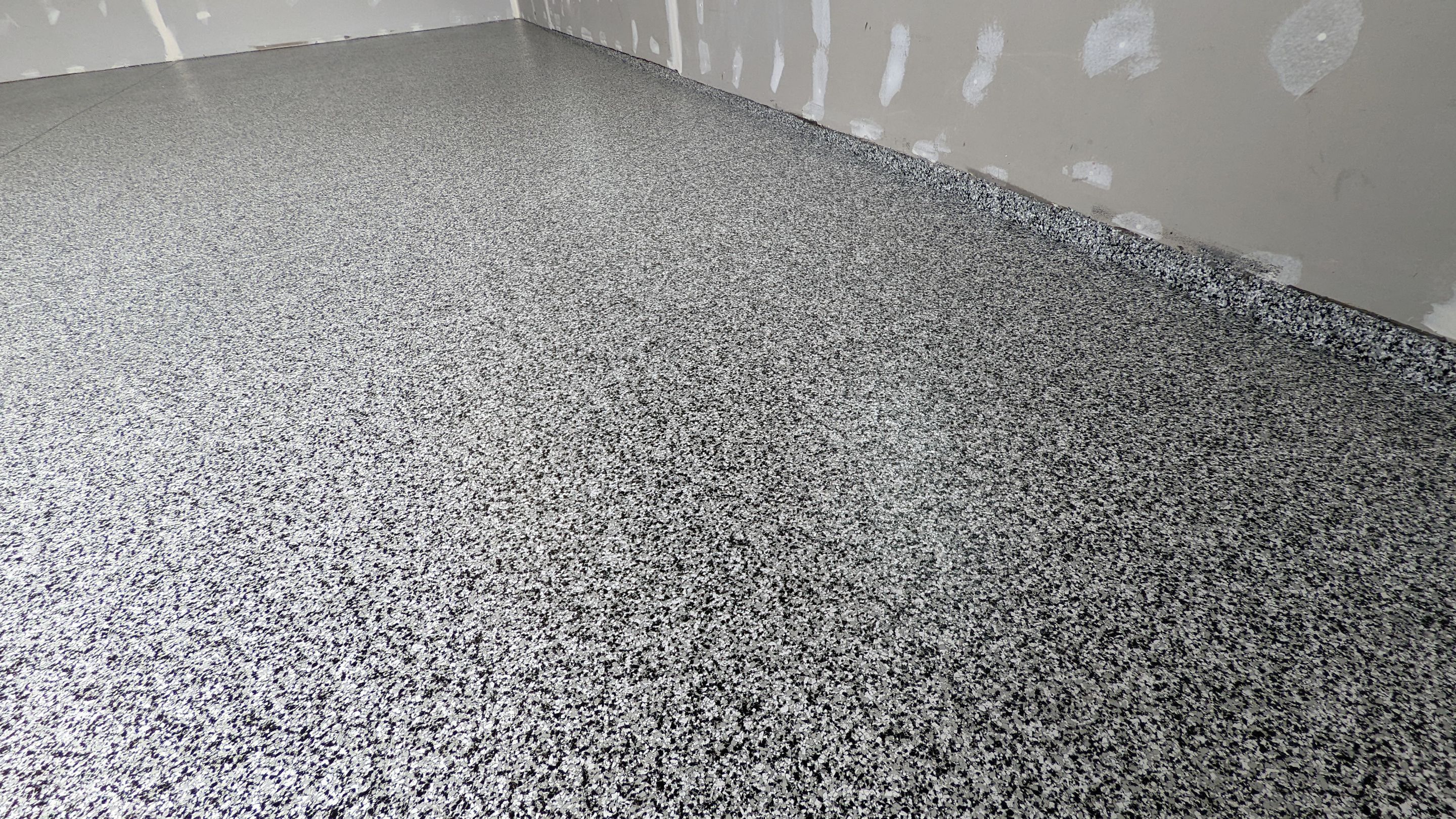 Garage Transformation using Domino by Croc Coatings, LLC