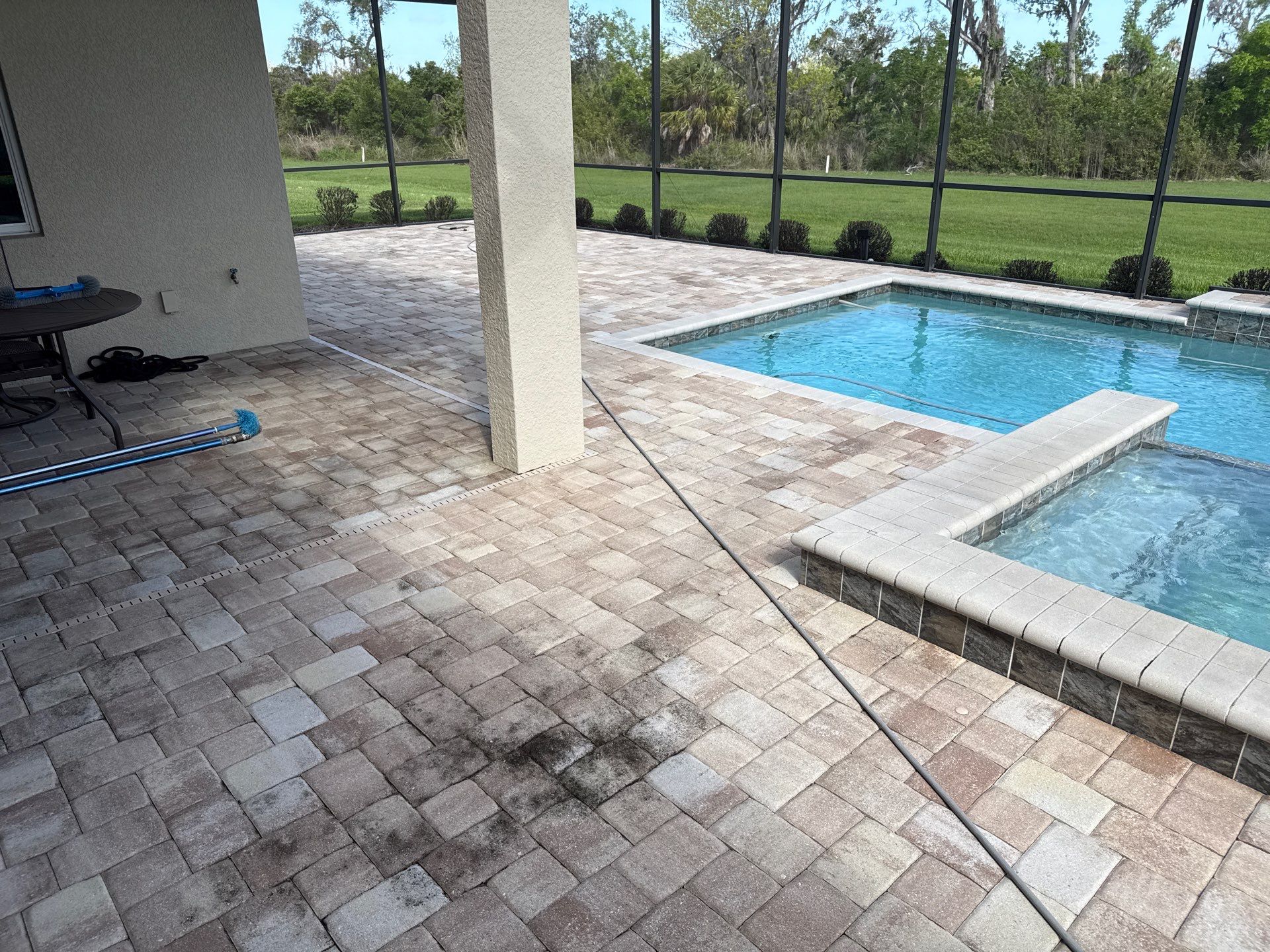 We recently completed a tile roof cleaning in the Vivienda at Bradenton community. The roof had visible algae buildup, which is common in Florida’s humid climate—especially on shaded areas.  For this project, we safely cleaned the roof using a ladder and ground-based soft wash application—no walking on the tile roof. This approach helps prevent cracked or broken tiles while still delivering a thorough, even cleaning.  Our soft washing process targets and eliminates algae at the root, restoring the roof’s appearance and helping extend its lifespan.  At Sunshine AquaWash, we prioritize safety, proper technique, and long-lasting results on every roof cleaning project. by Sunshine AquaWash