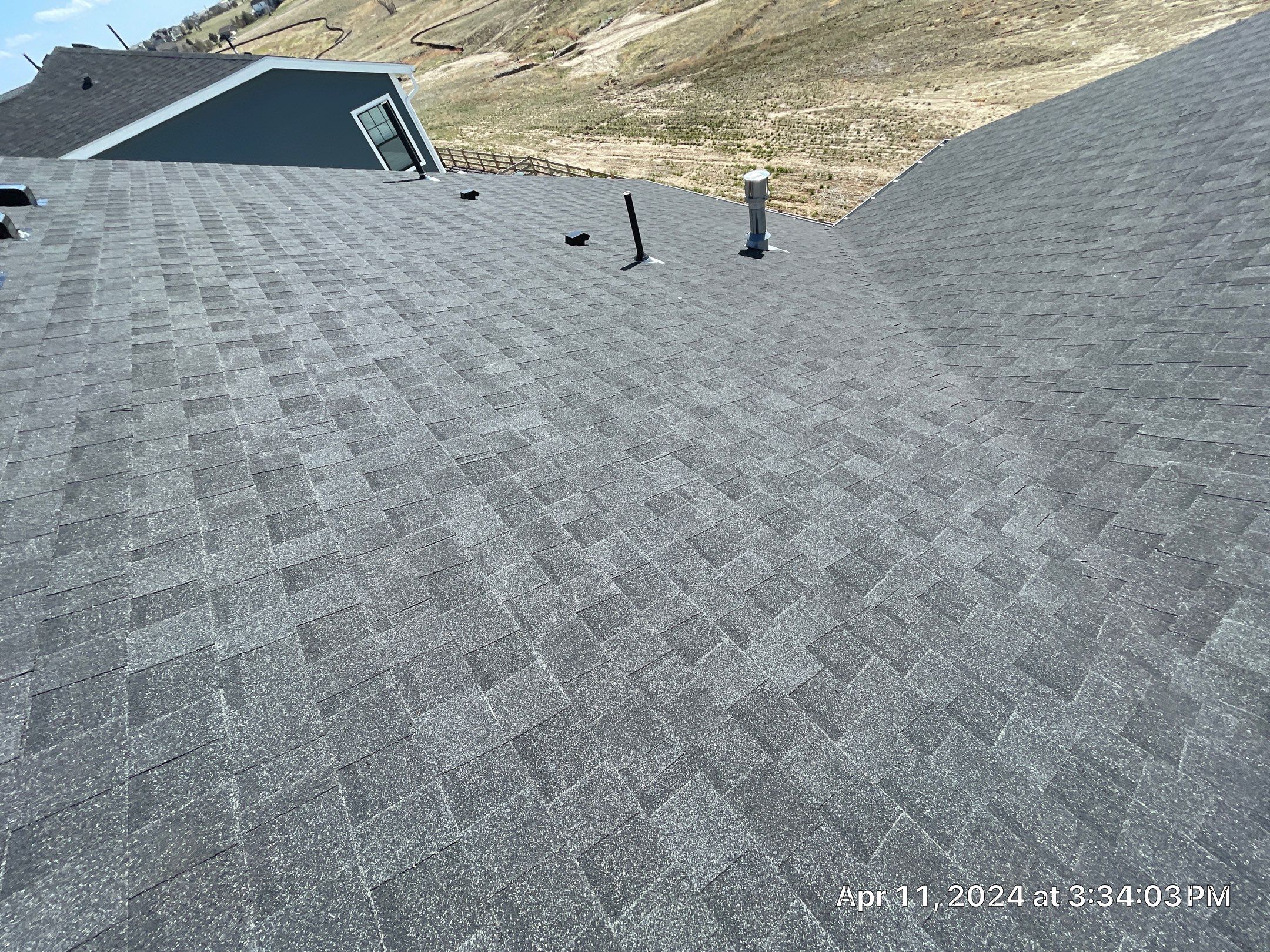 Residential Roofing Installation using Atlas Pinnacle Impact Black Shadow by Blue Peaks Roofing LLC 