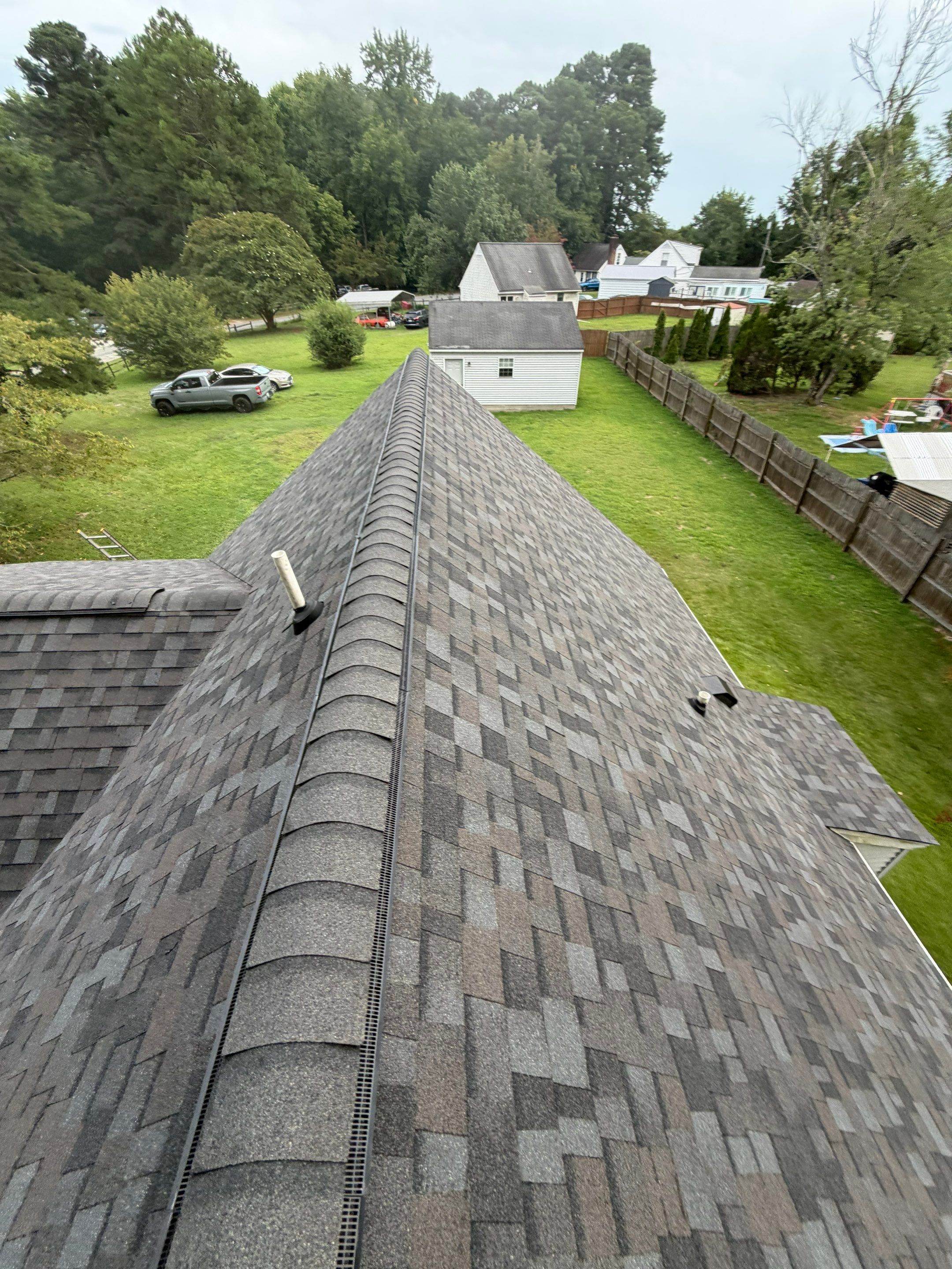 Asphalt Shingle Roof Replacement and Custom Porch Renovation in Hayes by Cade Construction