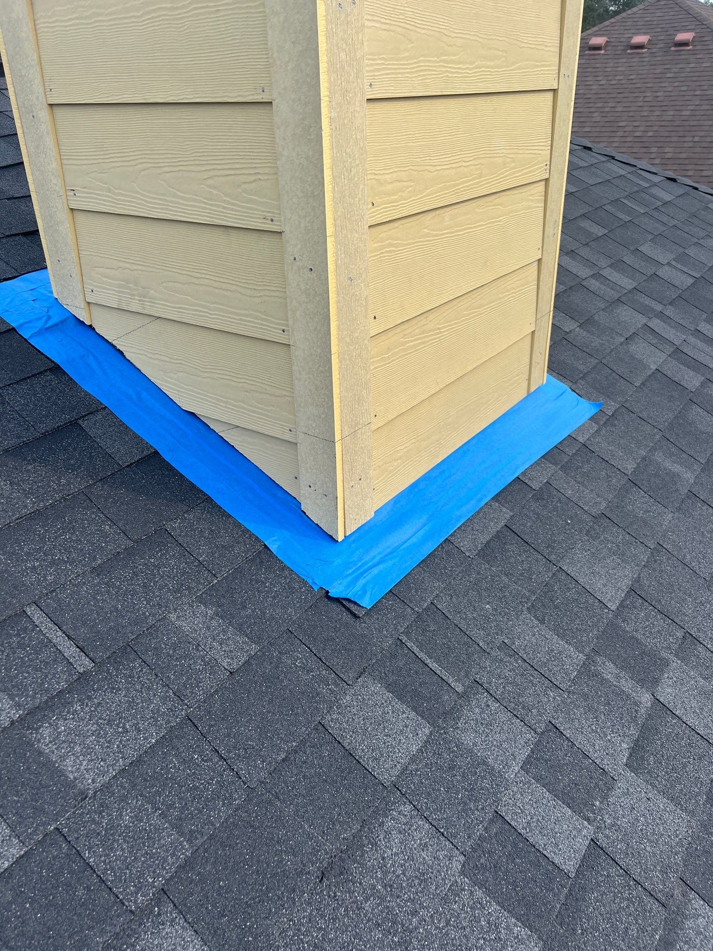 Nothing looks nicer than a little black roof by Bayfront Roofing and Construction