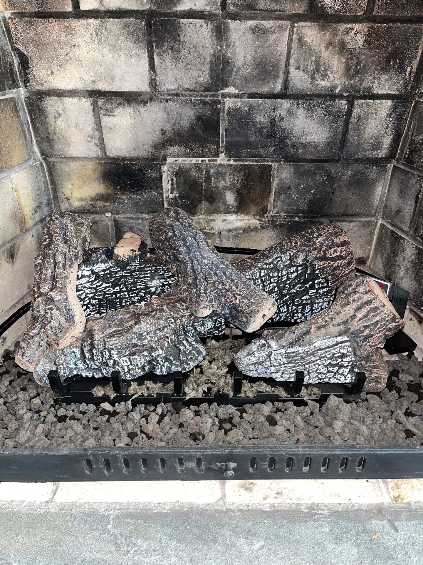 Gas Logs in Hampton by Premier Chimney and Roofing