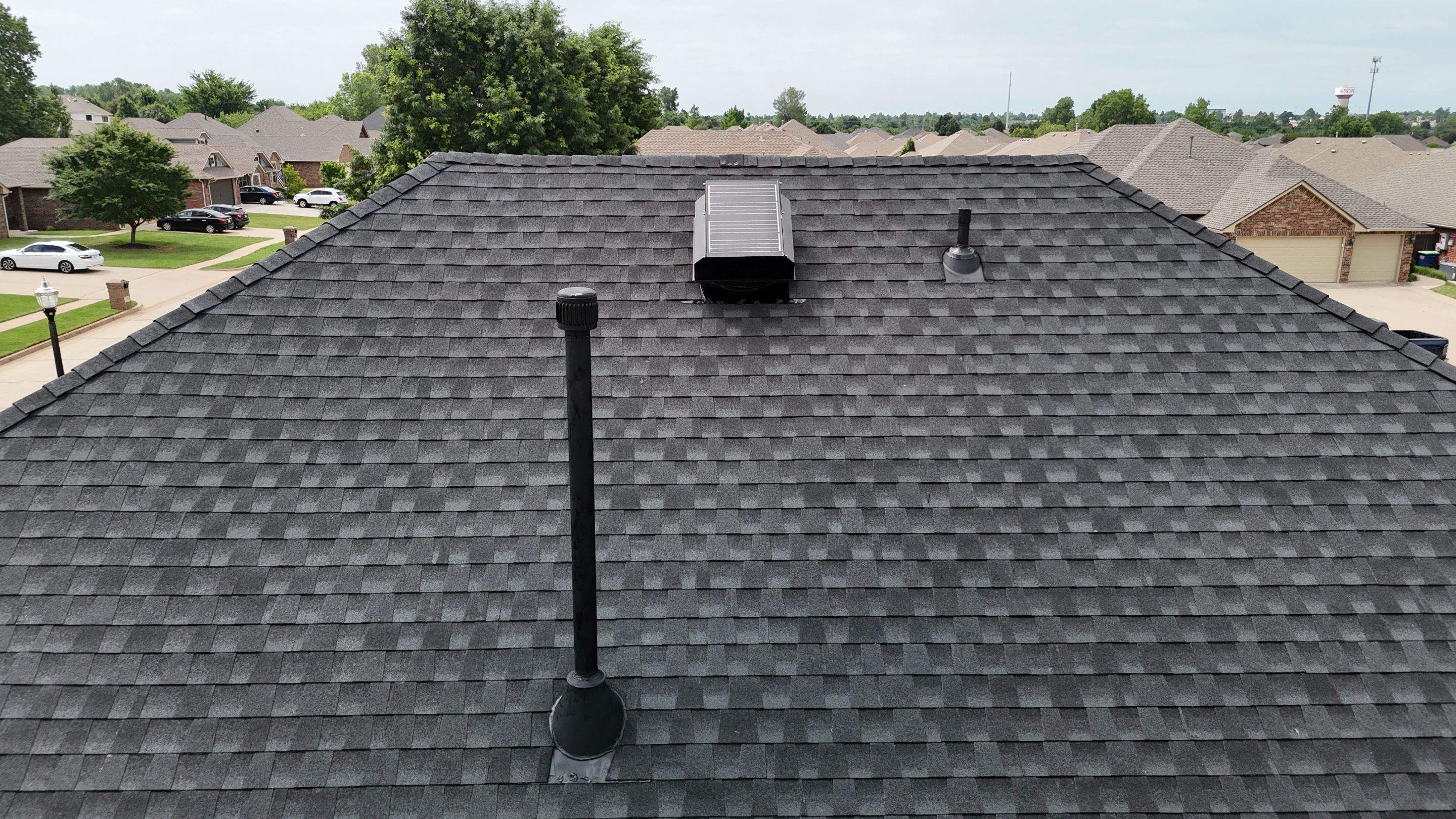 Roof Replacement in Mustang, OK by 5Coat Roofing & Construction