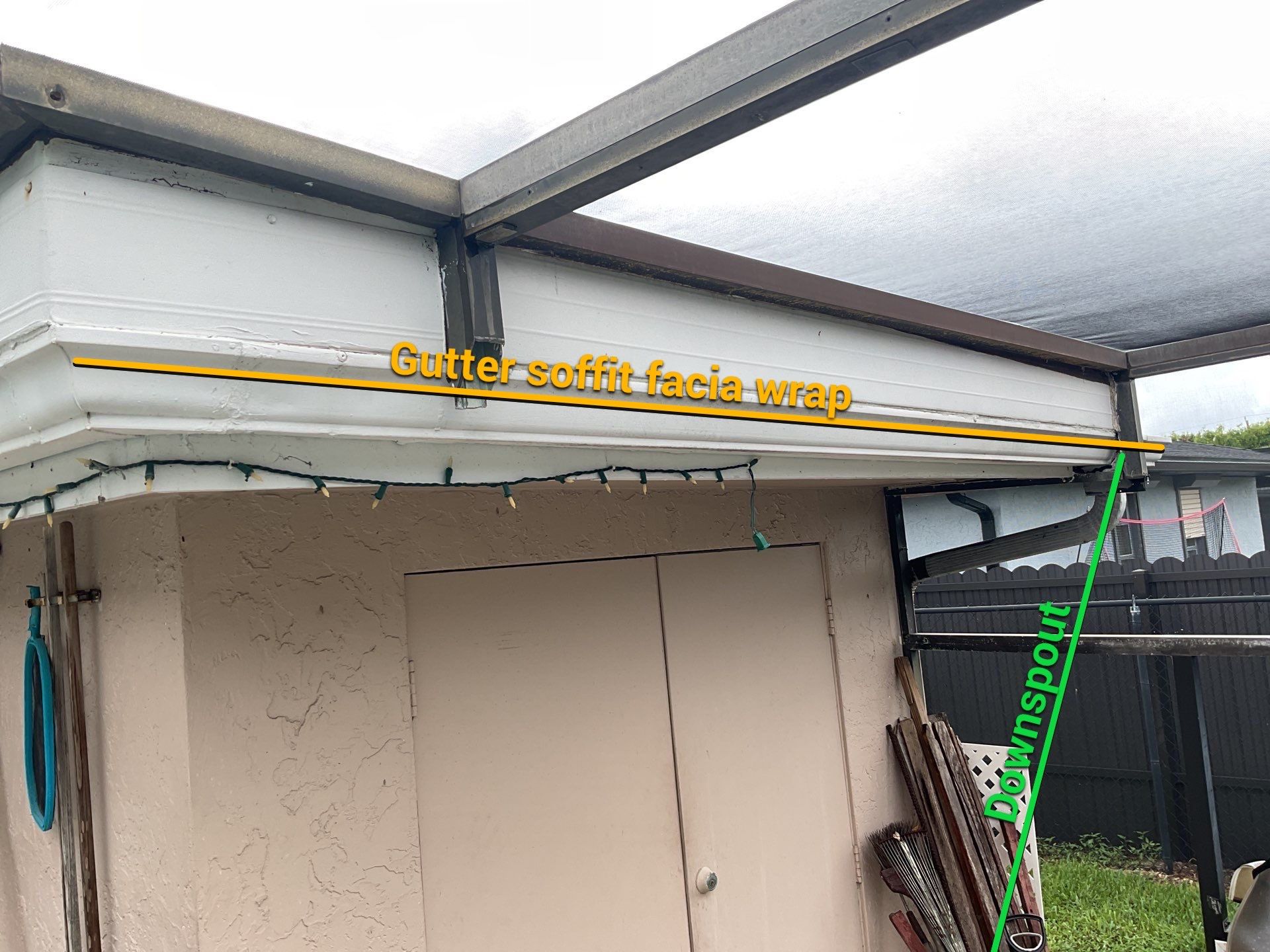 White Seamless Gutters and Splash Guards in Fort Myers FL by Gutter Professor by Gutter Professors