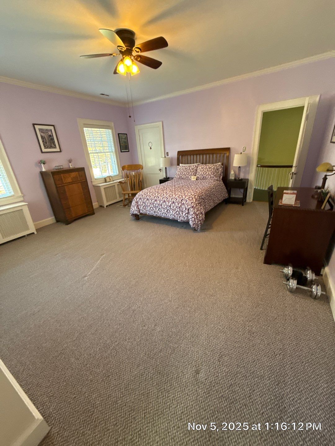 Two bedrooms with hardwood under carpet by Accent Custom Floors