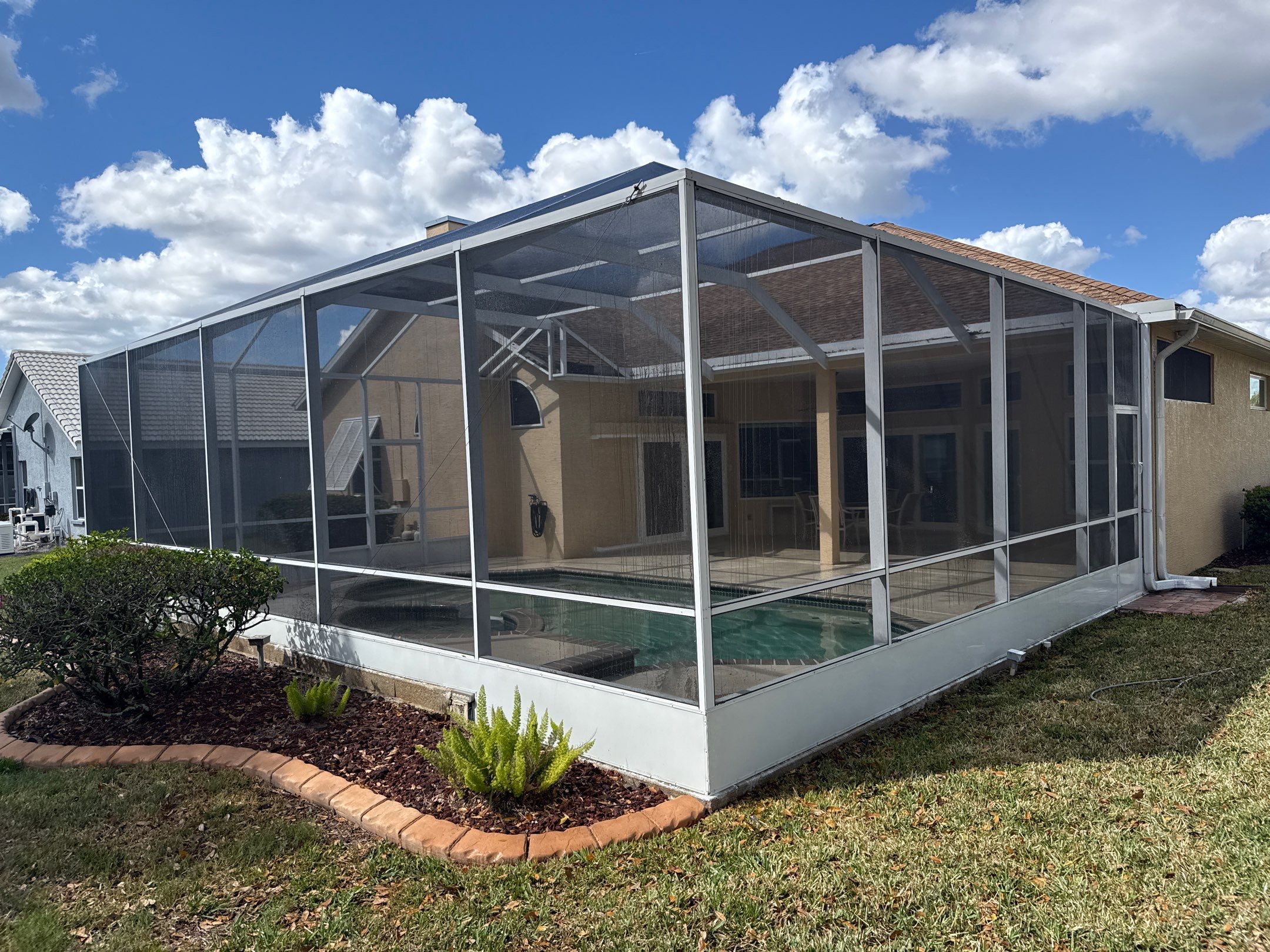 Painted Pool Deck, Pool Cage & Exterior Surface Cleaning in Creekwood – Bradenton, FL by Sunshine AquaWash
