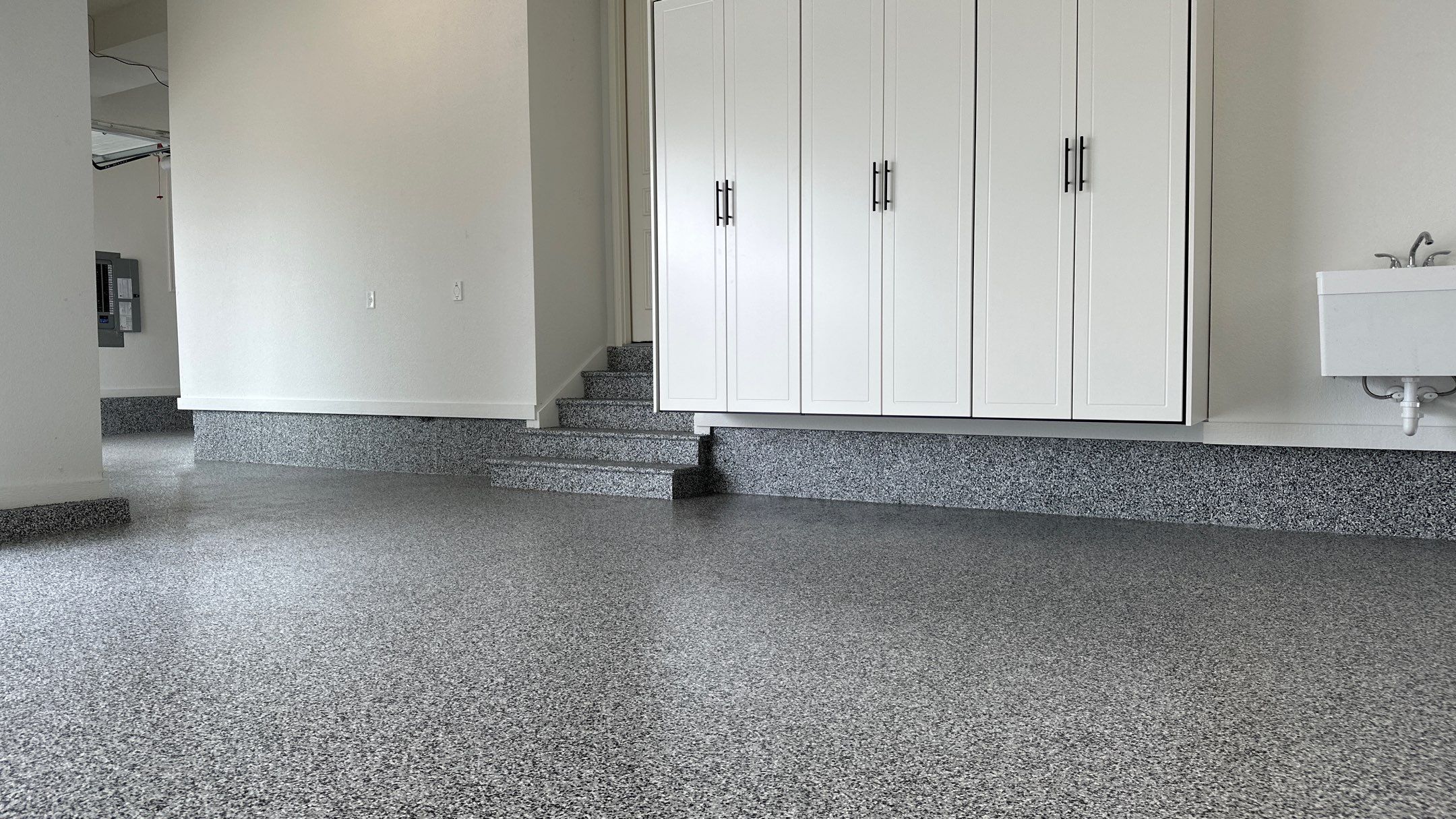 Mike & Pam transformed their garage with a Banner Garage Floor and Cabinets by Banner Garage