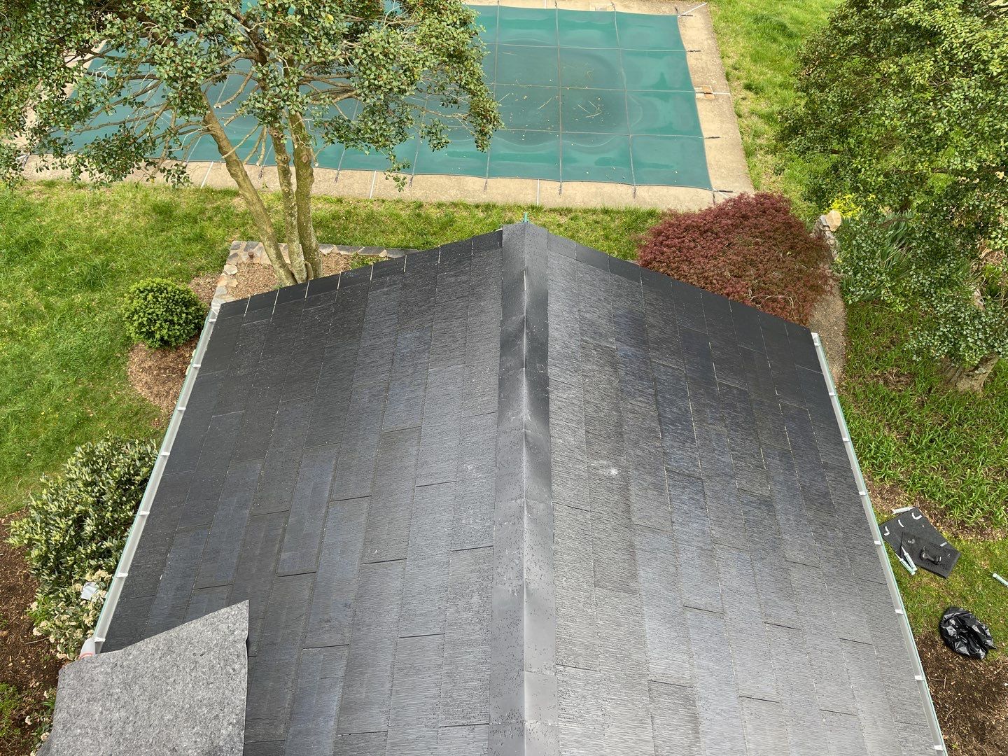 Tesla Solar Roof Replacement by American Home Contractors