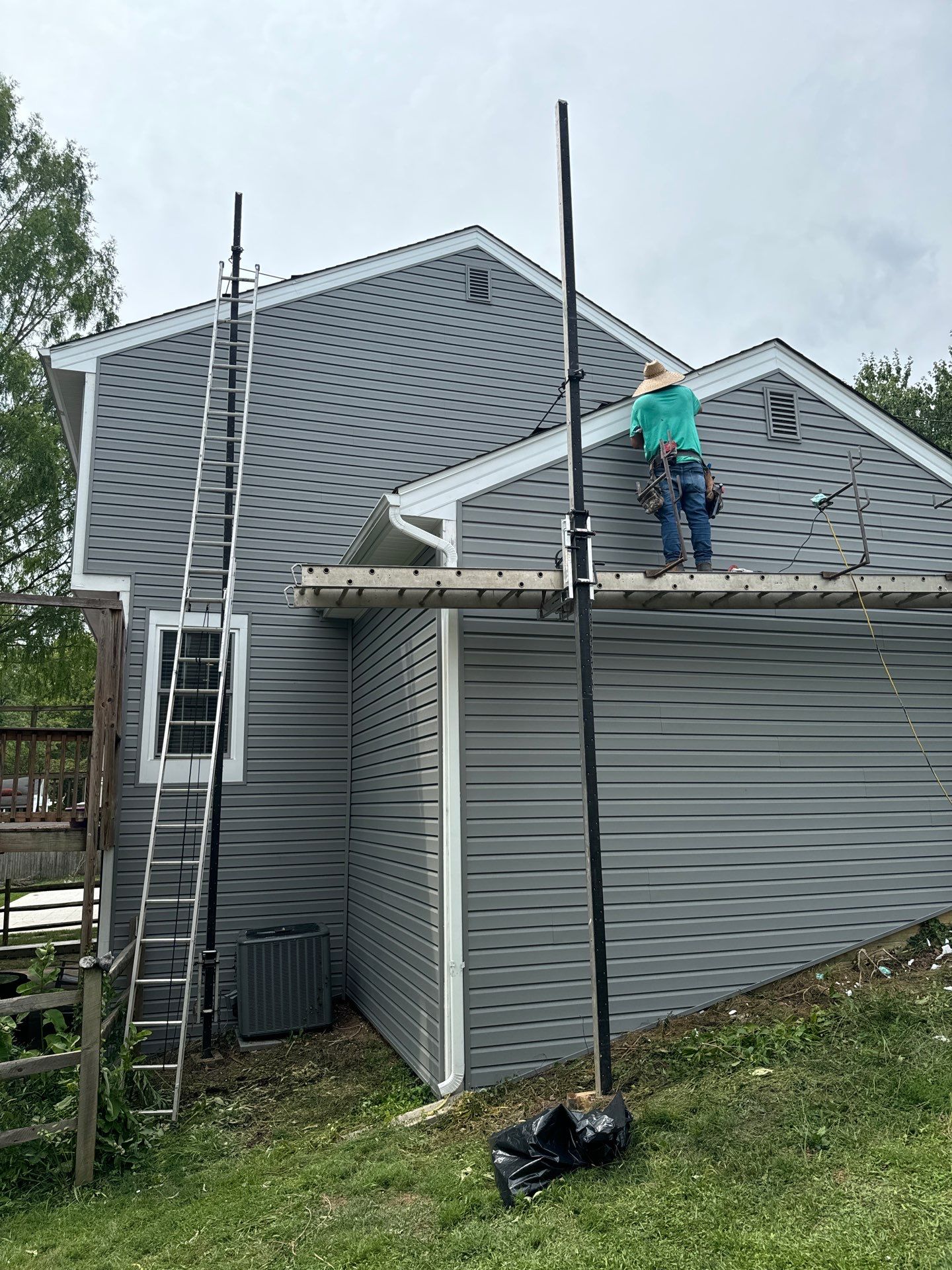 New Prodigy siding with One-piece insulated siding system & Exterior painting   by Alpha Design Services