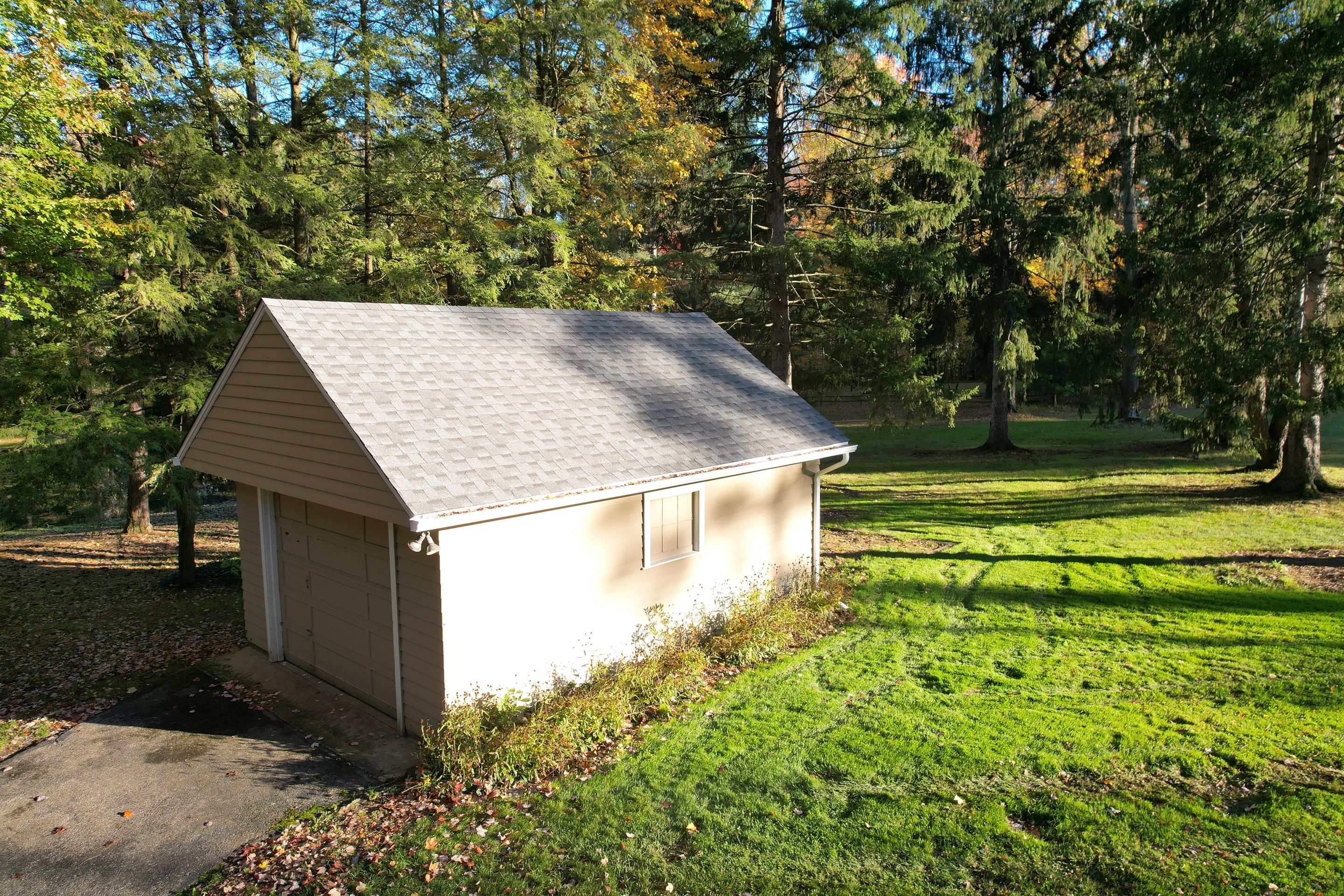 Moreland Hills Roof + Gutters Replacement by Atlas Roofing & Restoration