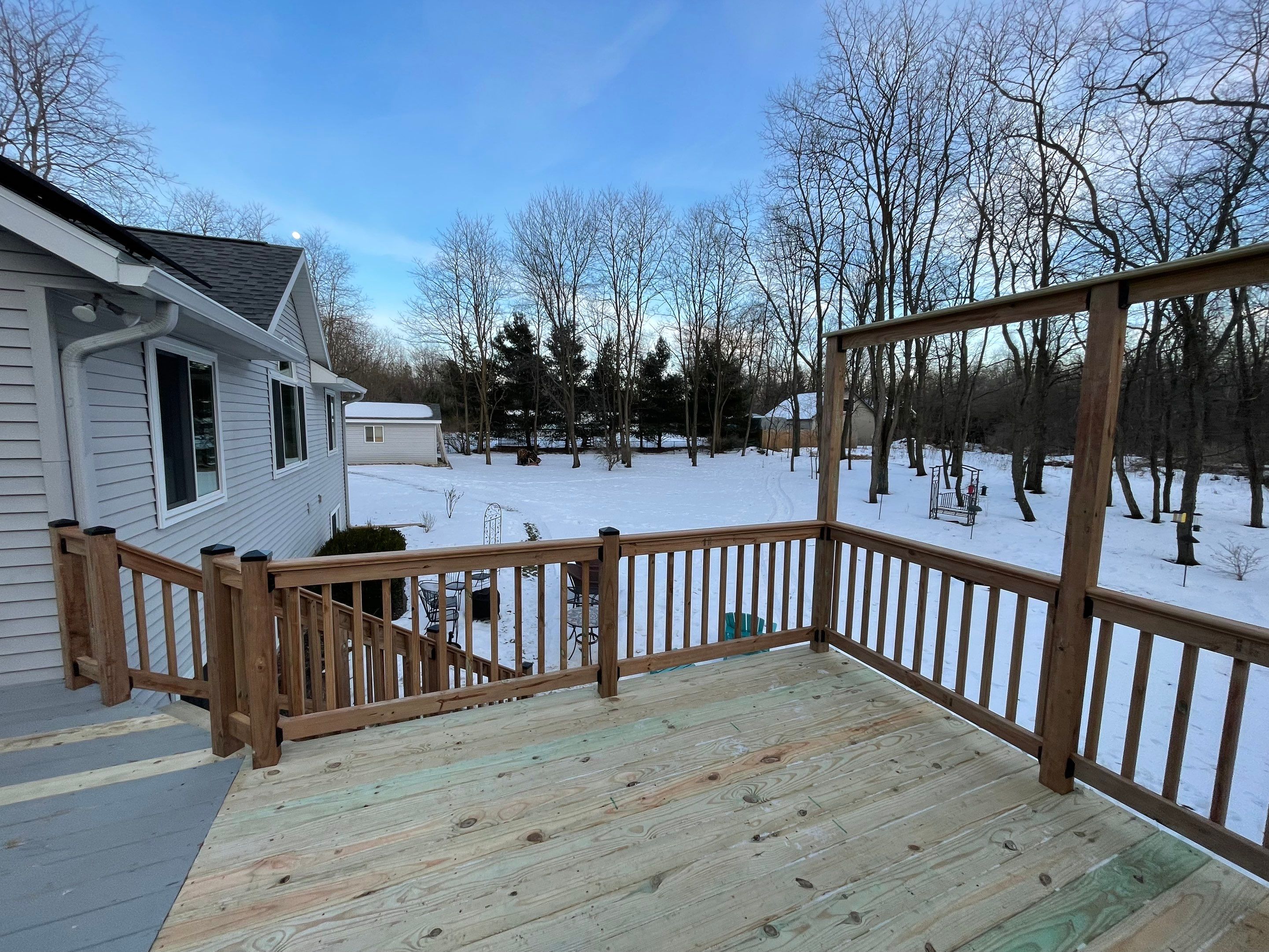 Deck Installation using Treated Lumber by Avalon Roofing and Exteriors
