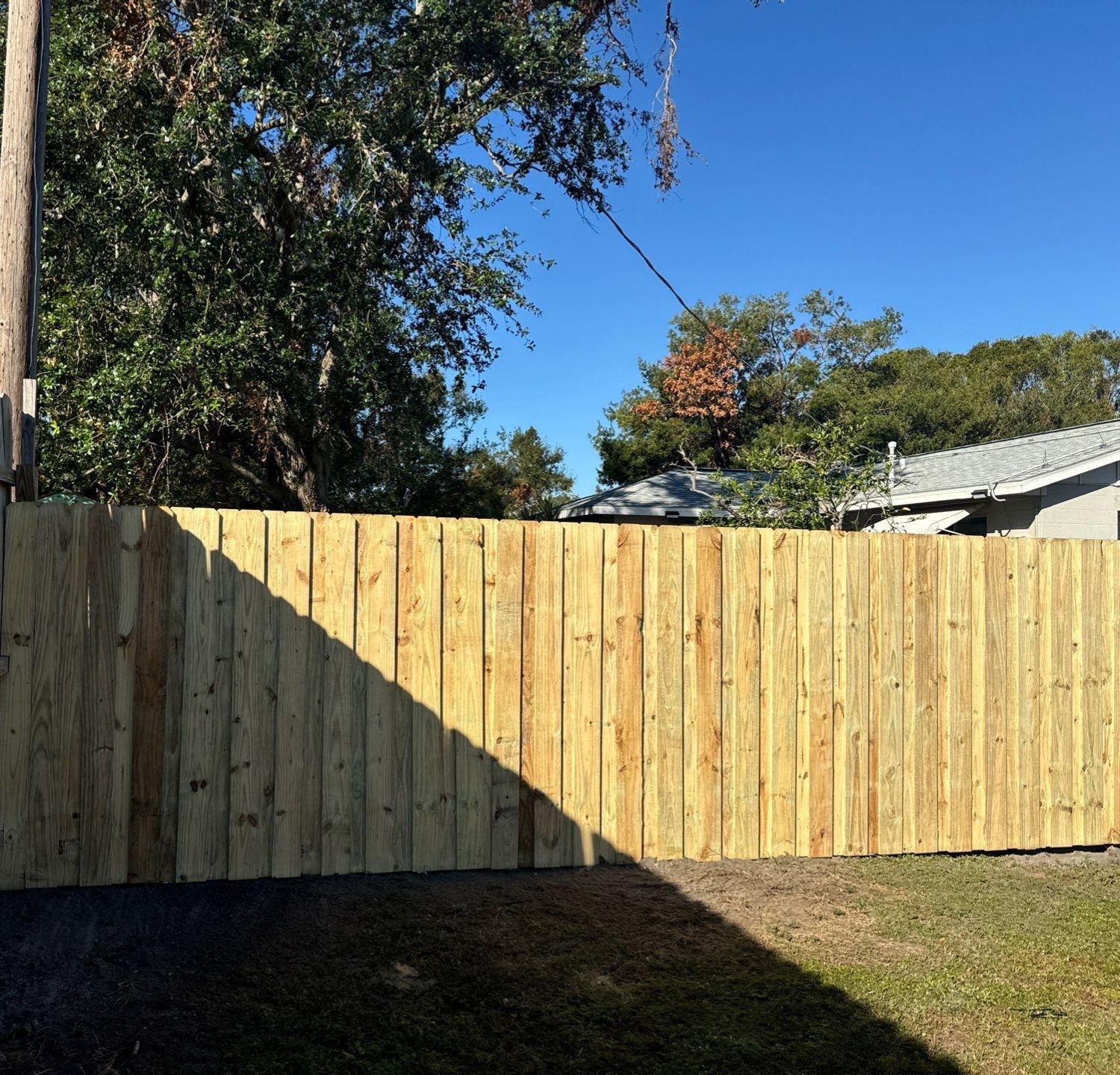 Wood Fence Installation using 6Ft Pressure Treated Wood Board On Board Privacy Fence by Asap fence and gates, LLC