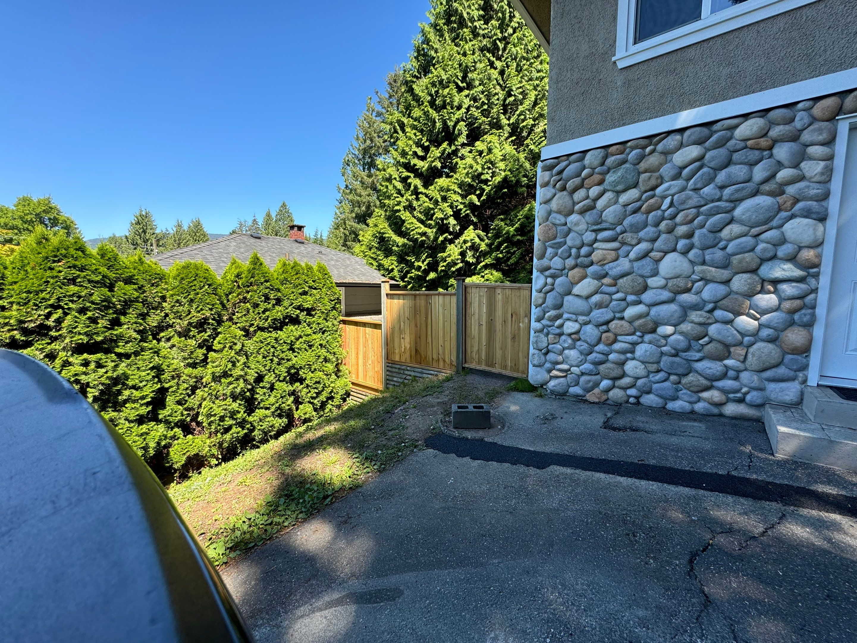 New Fence Installation - Edgemont Village by YVR Construction Group