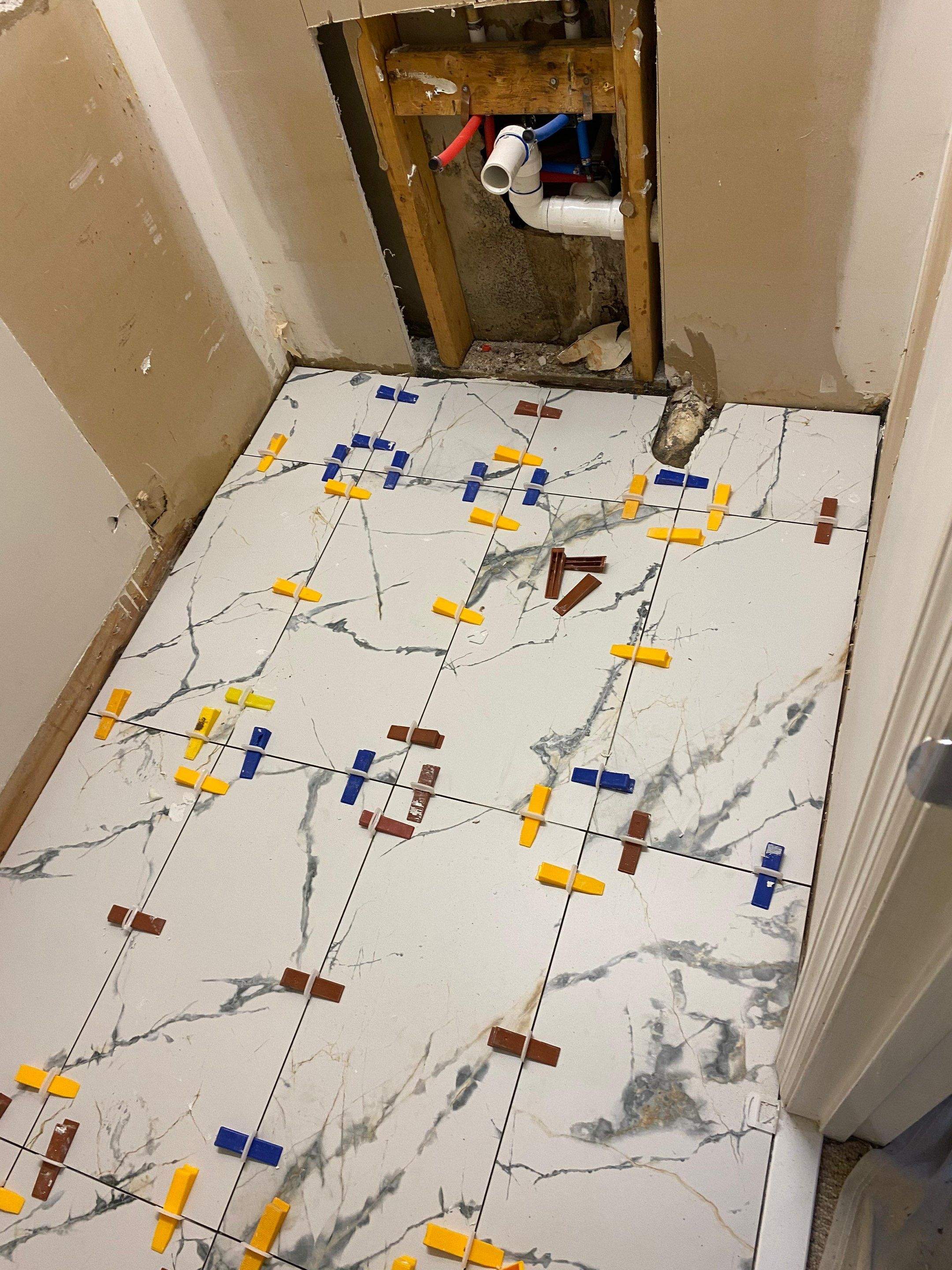 Half bathroom renovation by Prudencio