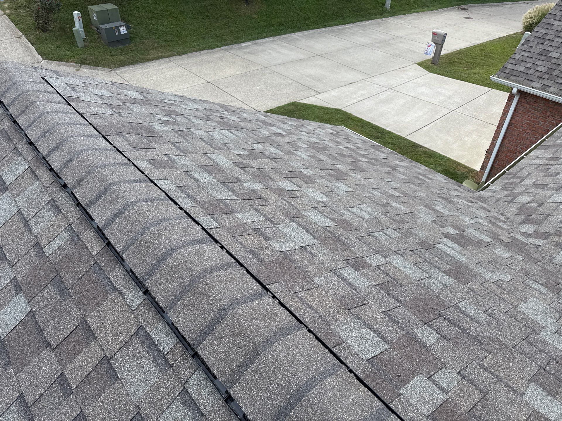 Residential Roofing Installation using Driftwood by Rainstoppers Roofing