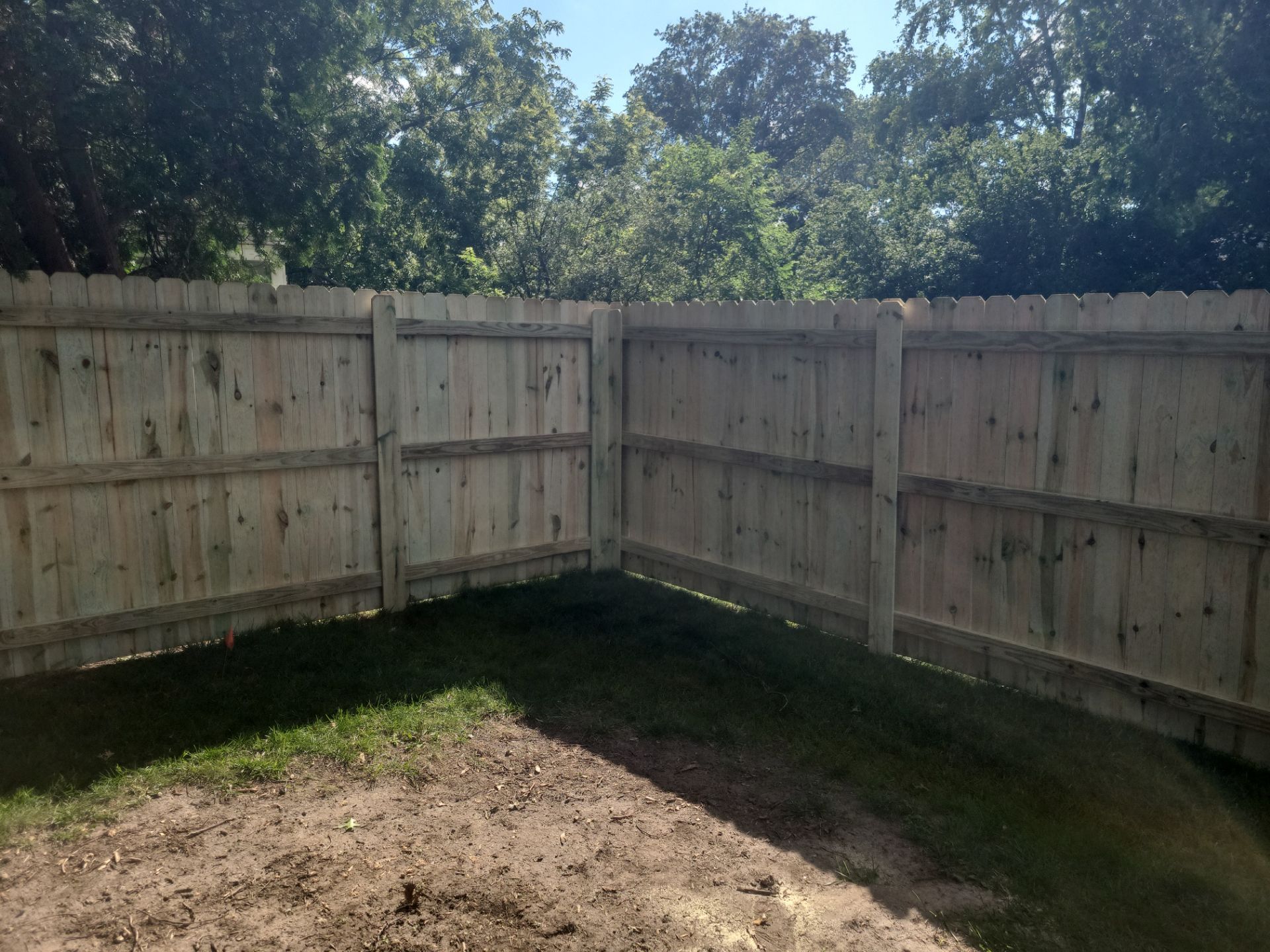Pressure-Treated Pine Privacy Fence and Custom Gates in Waterloo by Perfect Picket Fence and Stain