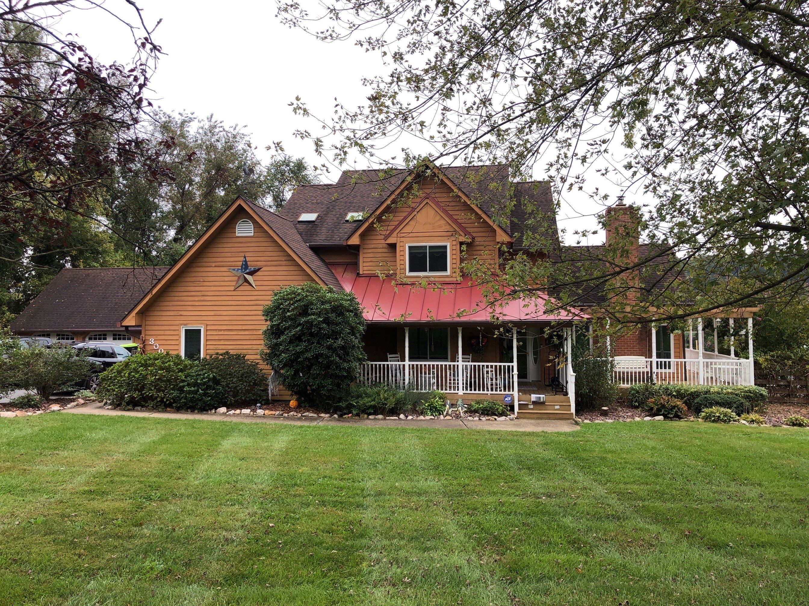 Complete Exterior Remodel by American Home Contractors
