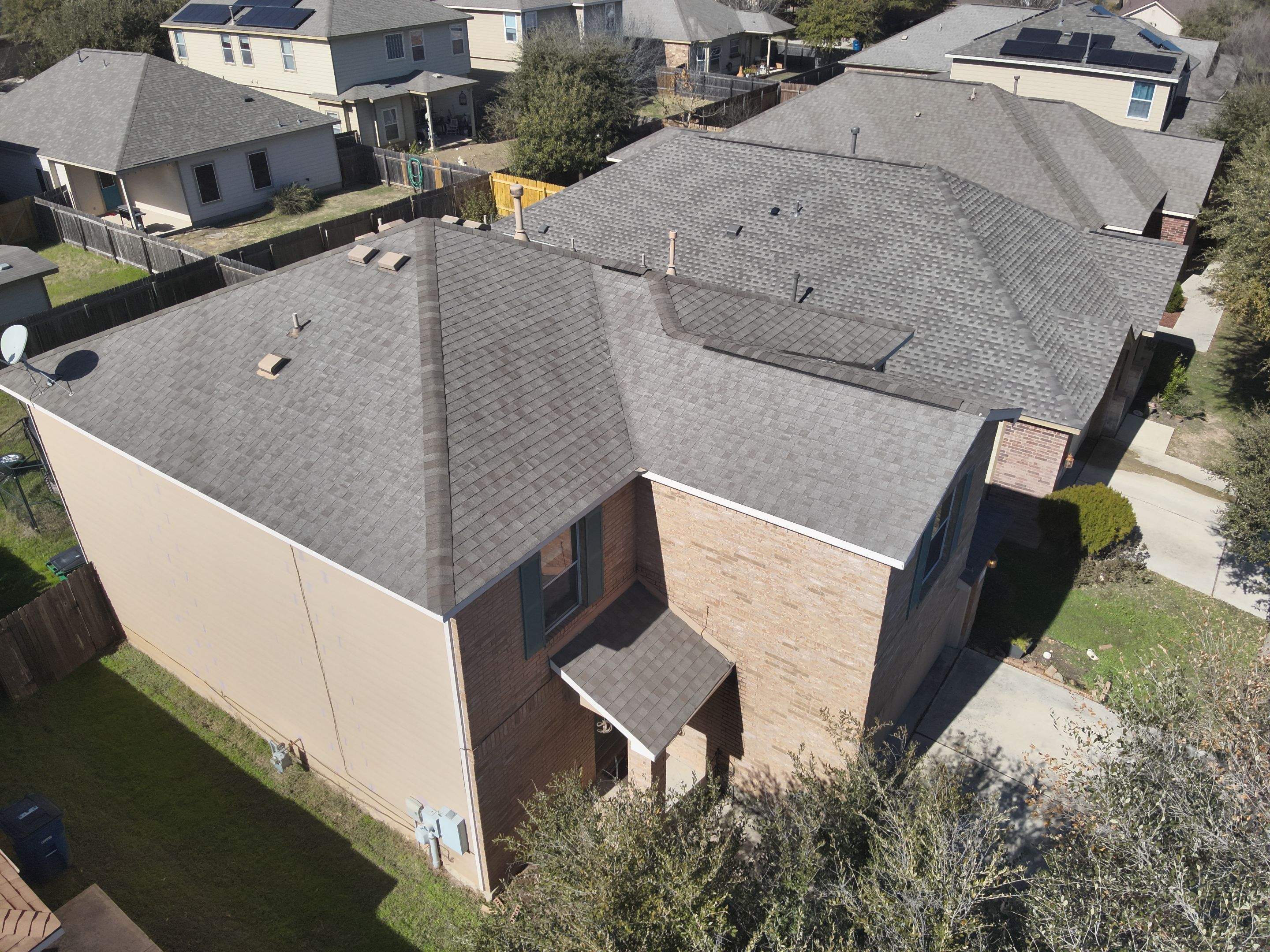 Residential Roof Replacement using Owens Corning - Duration - Driftwood by Action Exteriors Austin