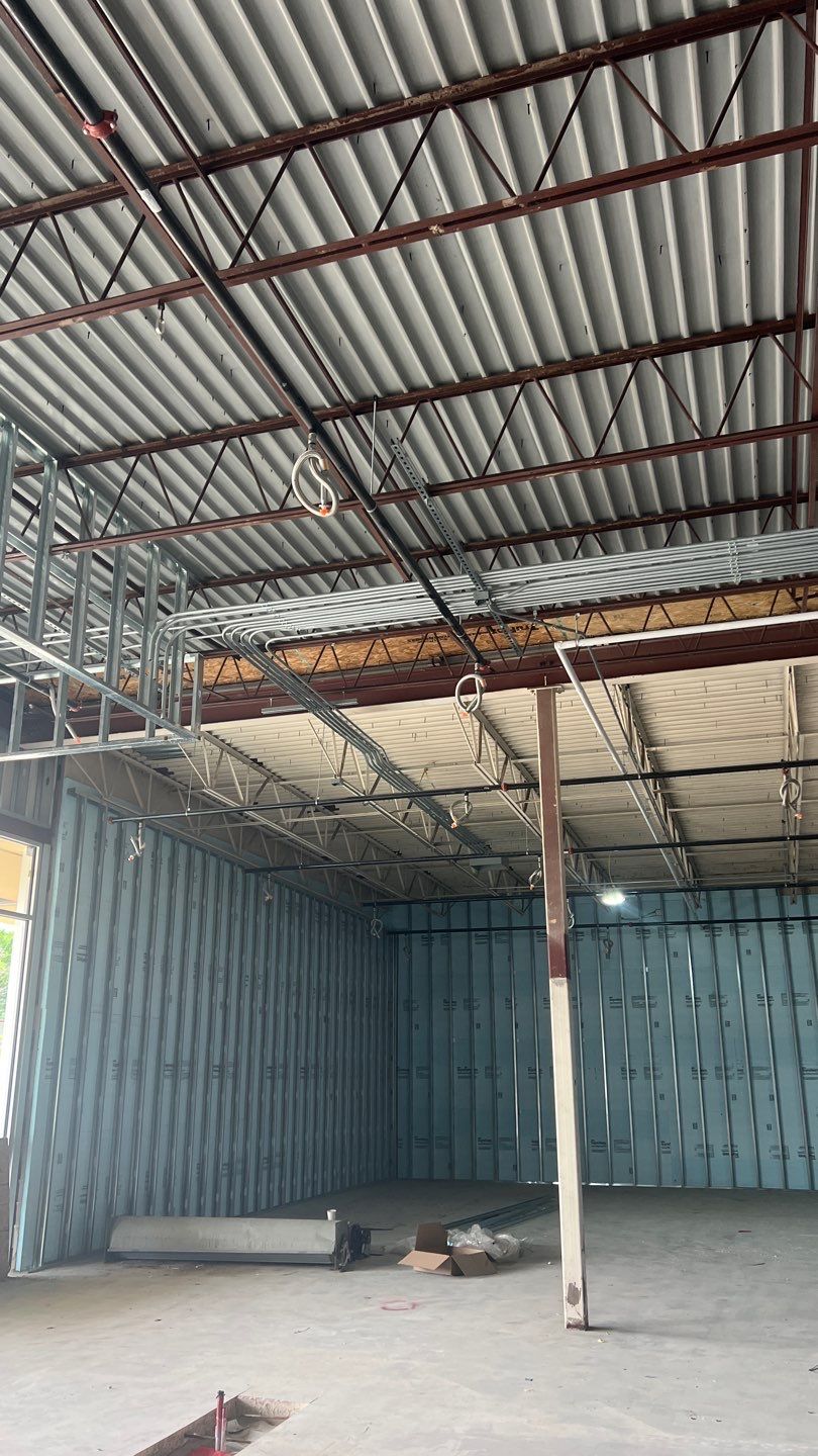 RETAIL TENANT INFILL by Argent Electric LLC