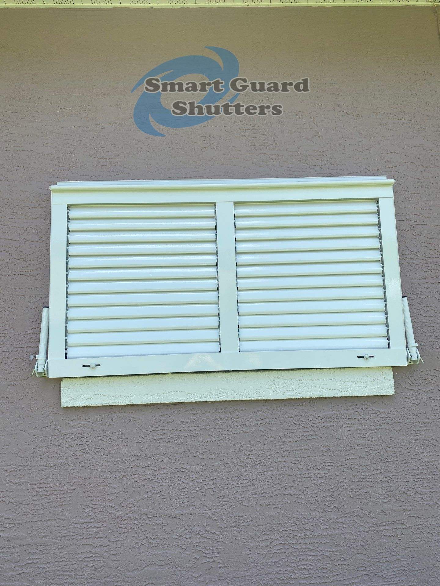 Impact Bahama Shutters in Signal White by Smart Guard Shutters