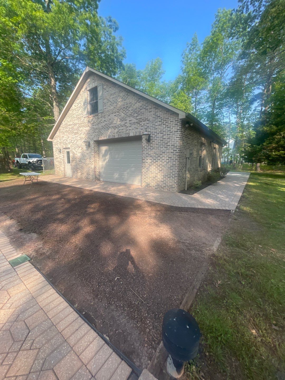 Pavers Cleaned, Garage and Concrete walls by SJ Exterior