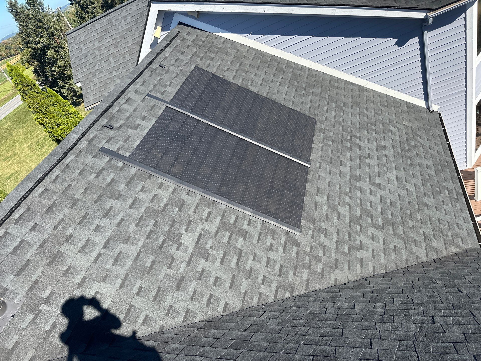 GAF Timberline Solar Roof Installation in Pittsford, NY by American Home Contractors