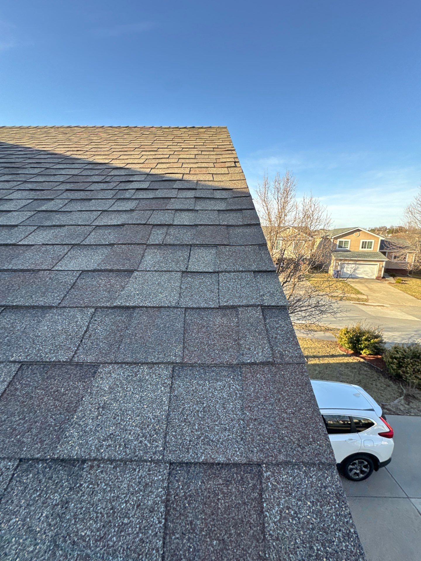 Storm Damage Inspection and Asphalt Shingle Roof Restoration in Omaha by Crows Roofing LLC