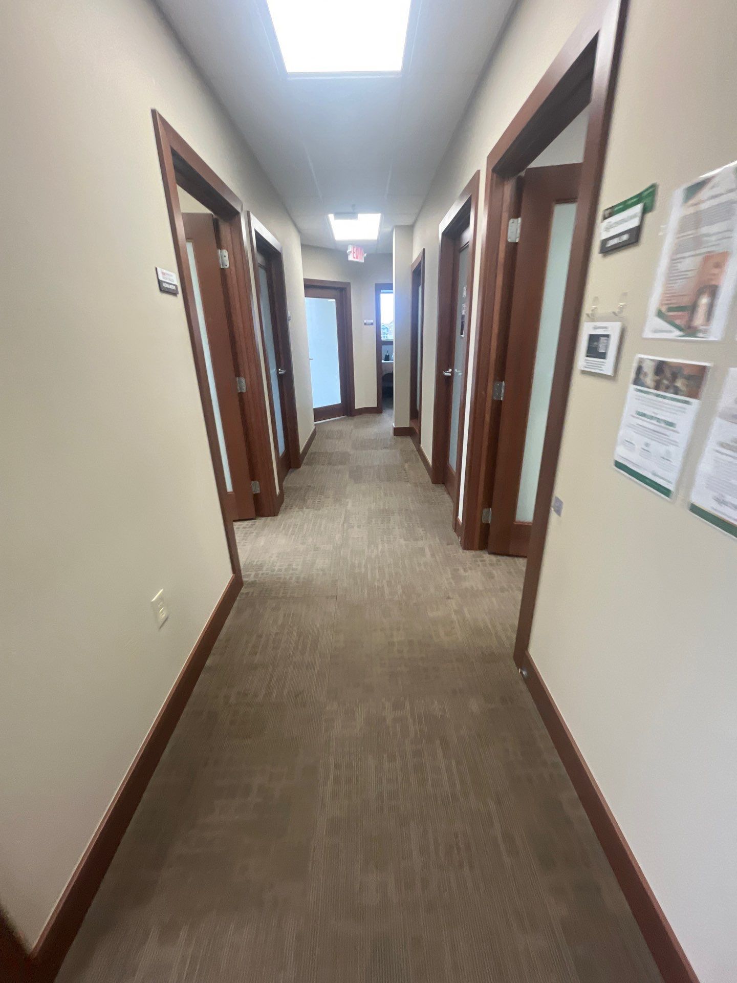 Commercial Office Interior Remodel and Modern Suite Refresh in Sioux Falls by Select Painting, Coatings & Garage Cabinets