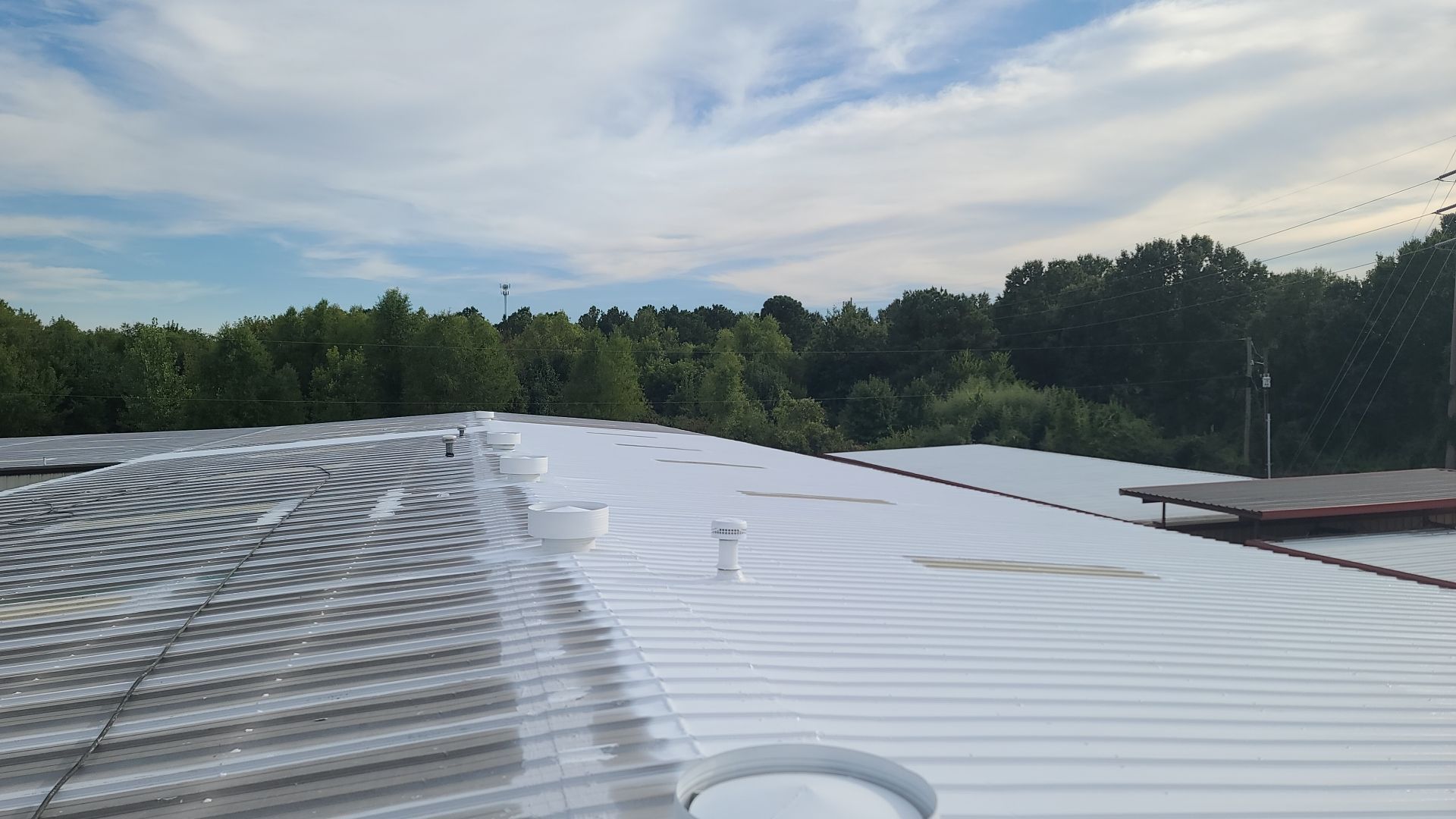 Commercial Metal Restoration System using Aldocoat Coatings by Hostetler Roofing