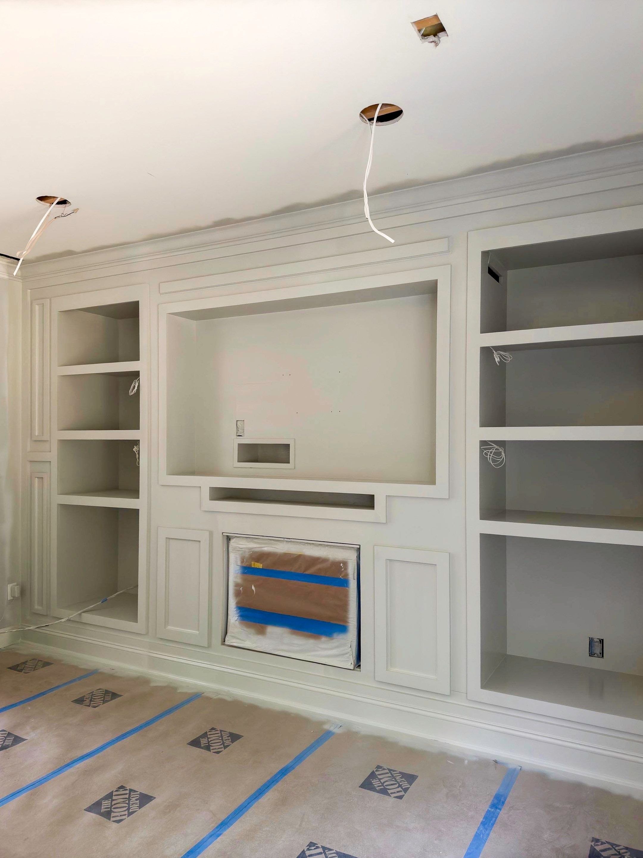 Built-in TV unit by Trendy Walls Inc.