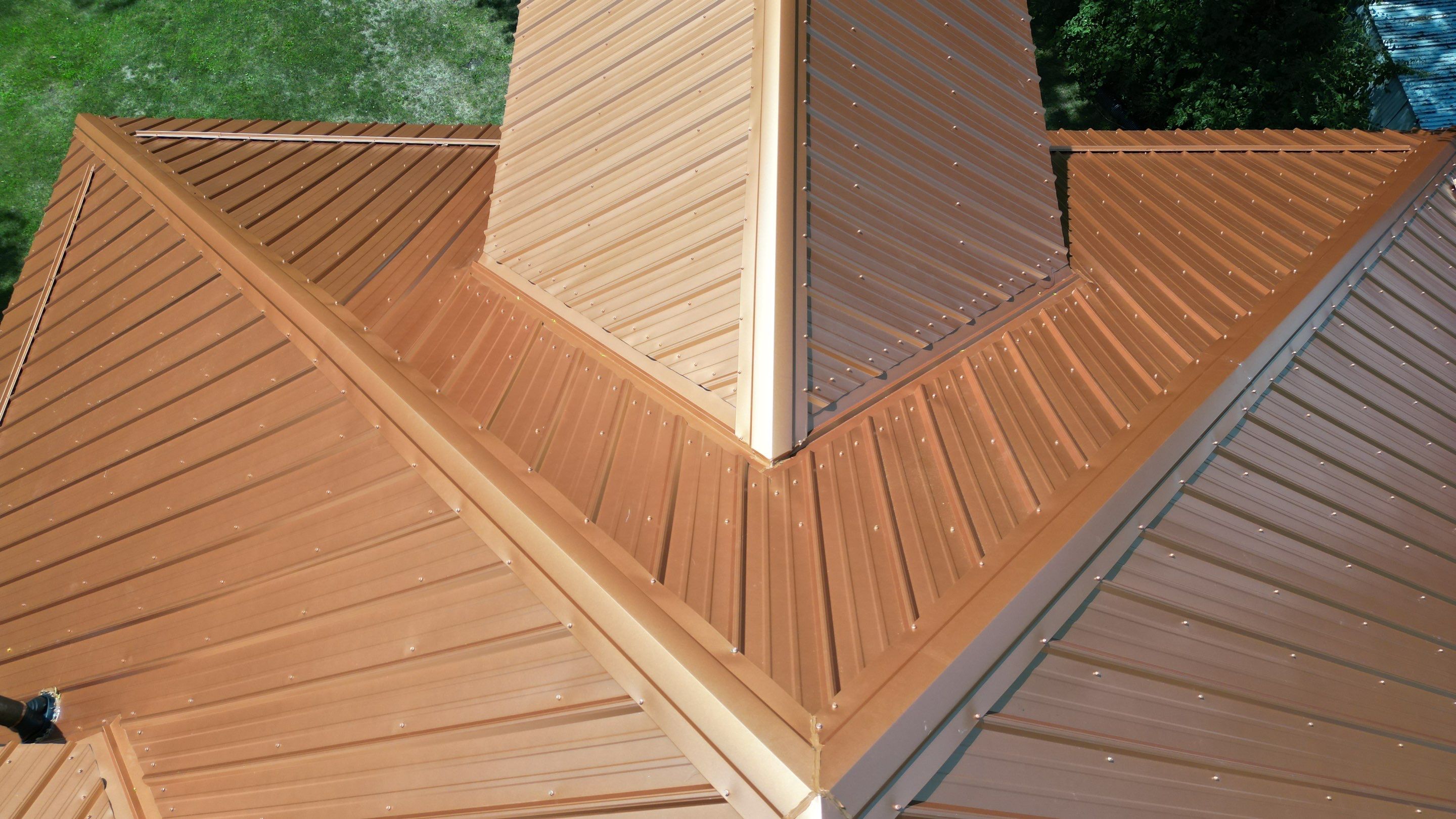 Residential Roofing Installation using Performance Panel Metal - Copper Metallic by RoofX 