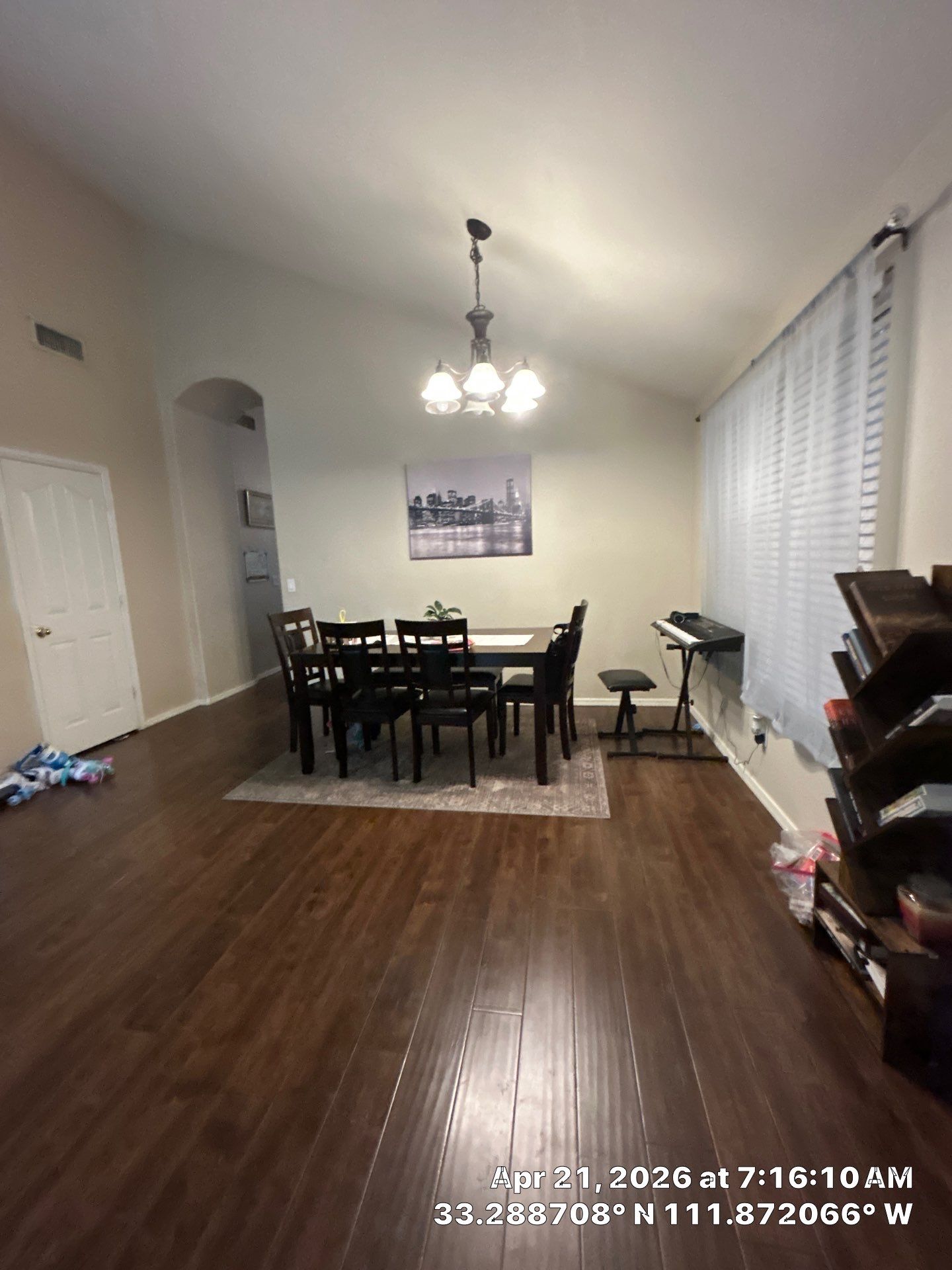 Dark Wood-Look Laminate Flooring Installation in Chandler Dining Room by CompanyCam Sales Demo