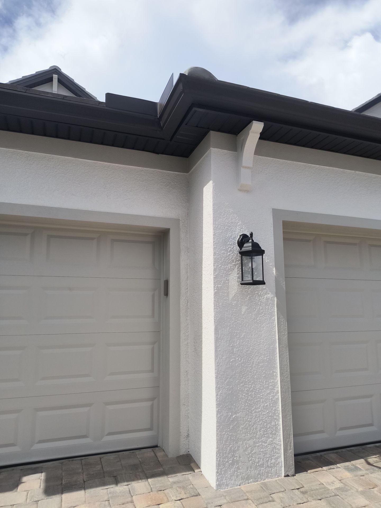 Dark Bronze Gutter Installation in Bradenton FL by Gutter Professors