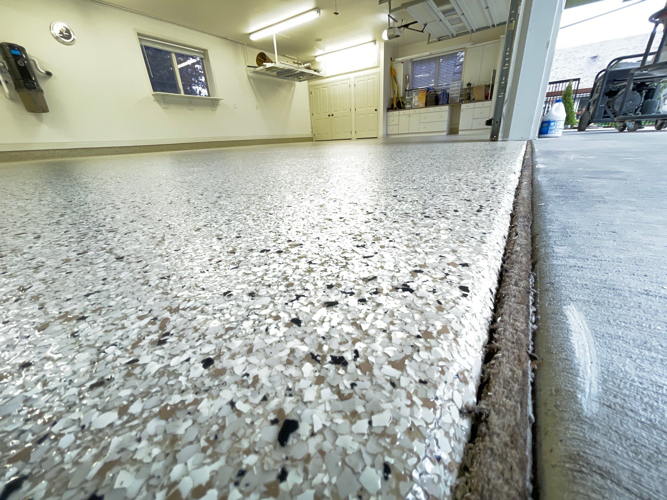 Garage Transformation using Driftwood Colorway by Croc Coatings, LLC