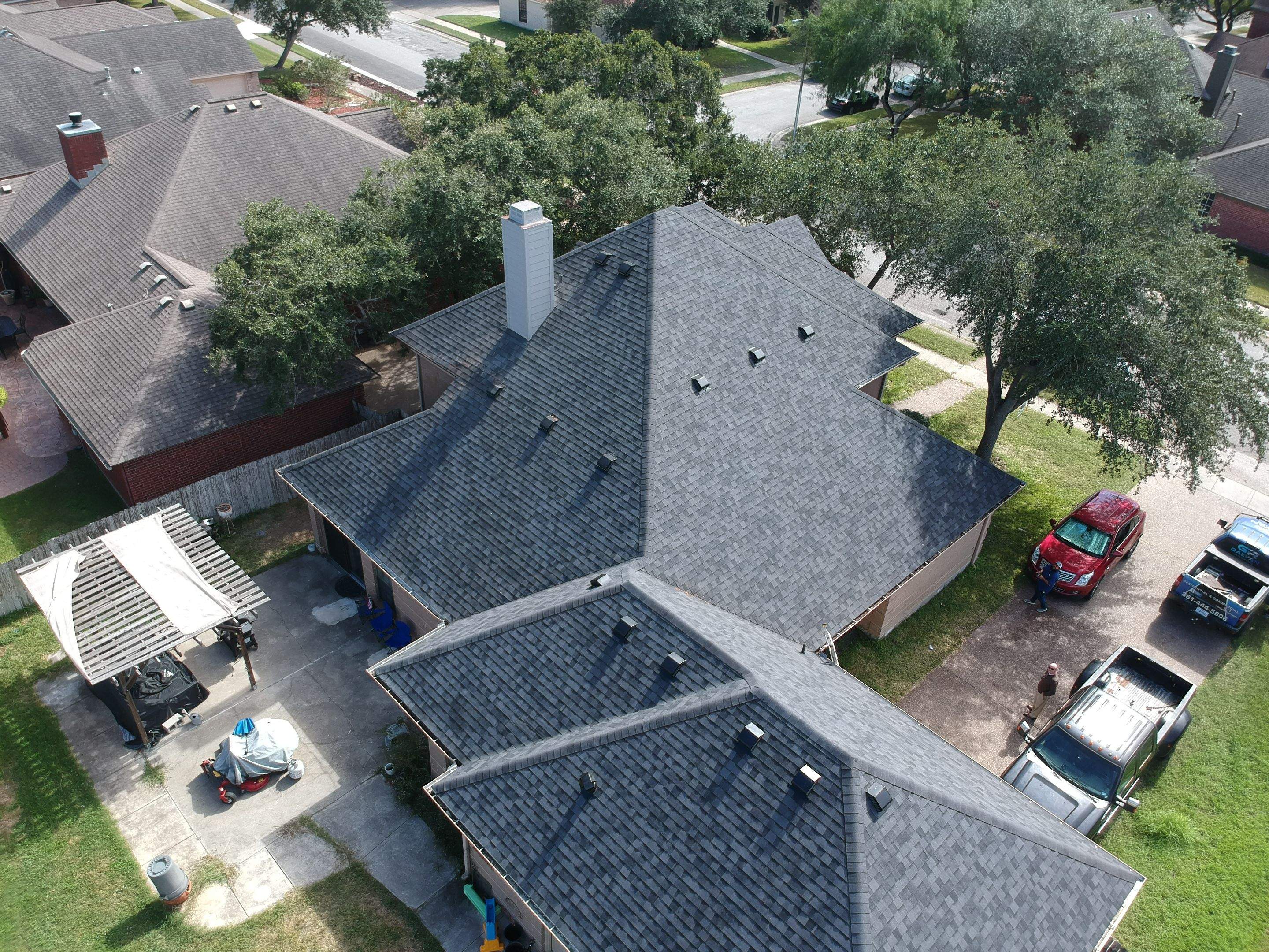 Residential Roofing Installation using Certainteed Landmark Moire Black by Galvan Roofing and Construction