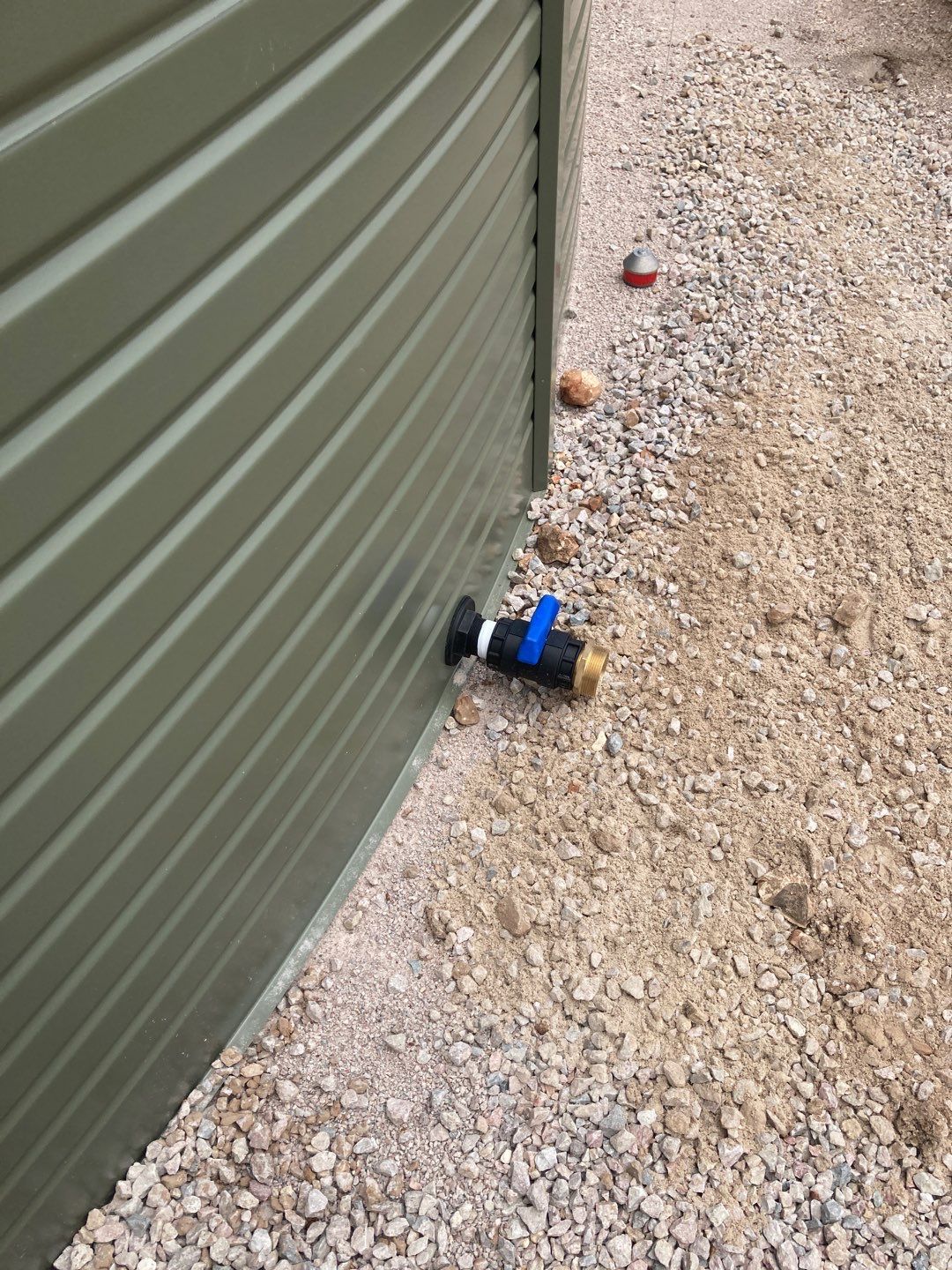 Residential Rainwater Collection System - Pioneer 40K gallon water tank in Mangrove Green by Hill Country Rain Water