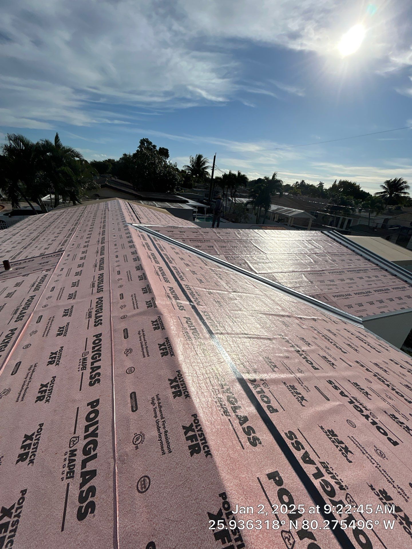 RESIDENTAL METAL REROOF 24 GUAGE DOVE GRAY 1-1/2" MECHANICAL SEAM METAL POLYGLASS POLYSTICK XFR by Earl W. Johnston Roofing 