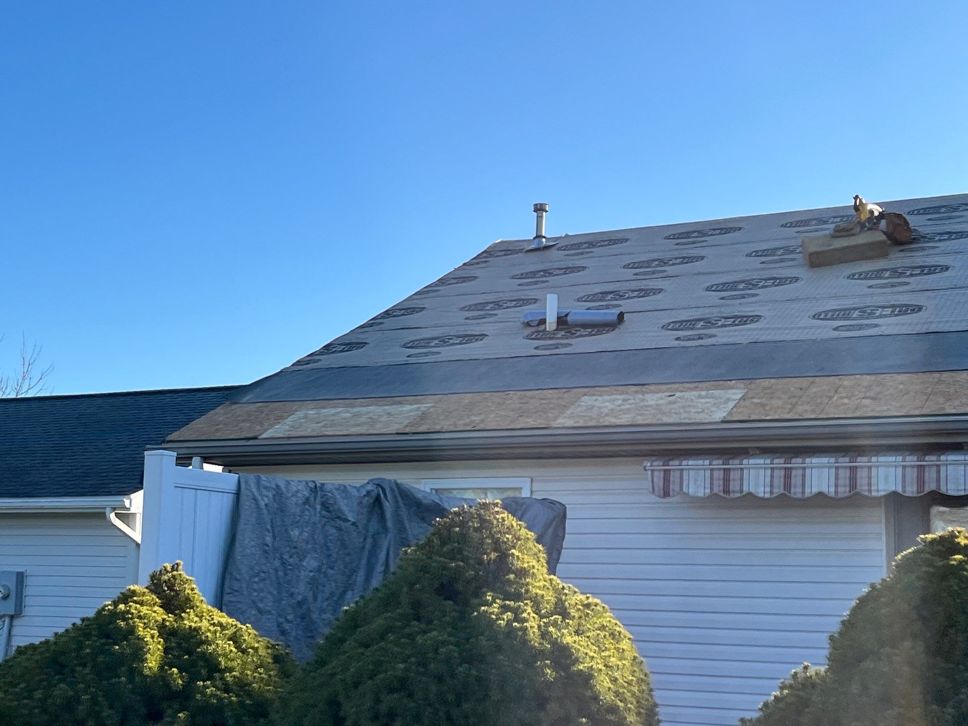 Residential Roofing Installation using CertainTeed Landmark Weathered Wood by Nitro Roofing and Construction