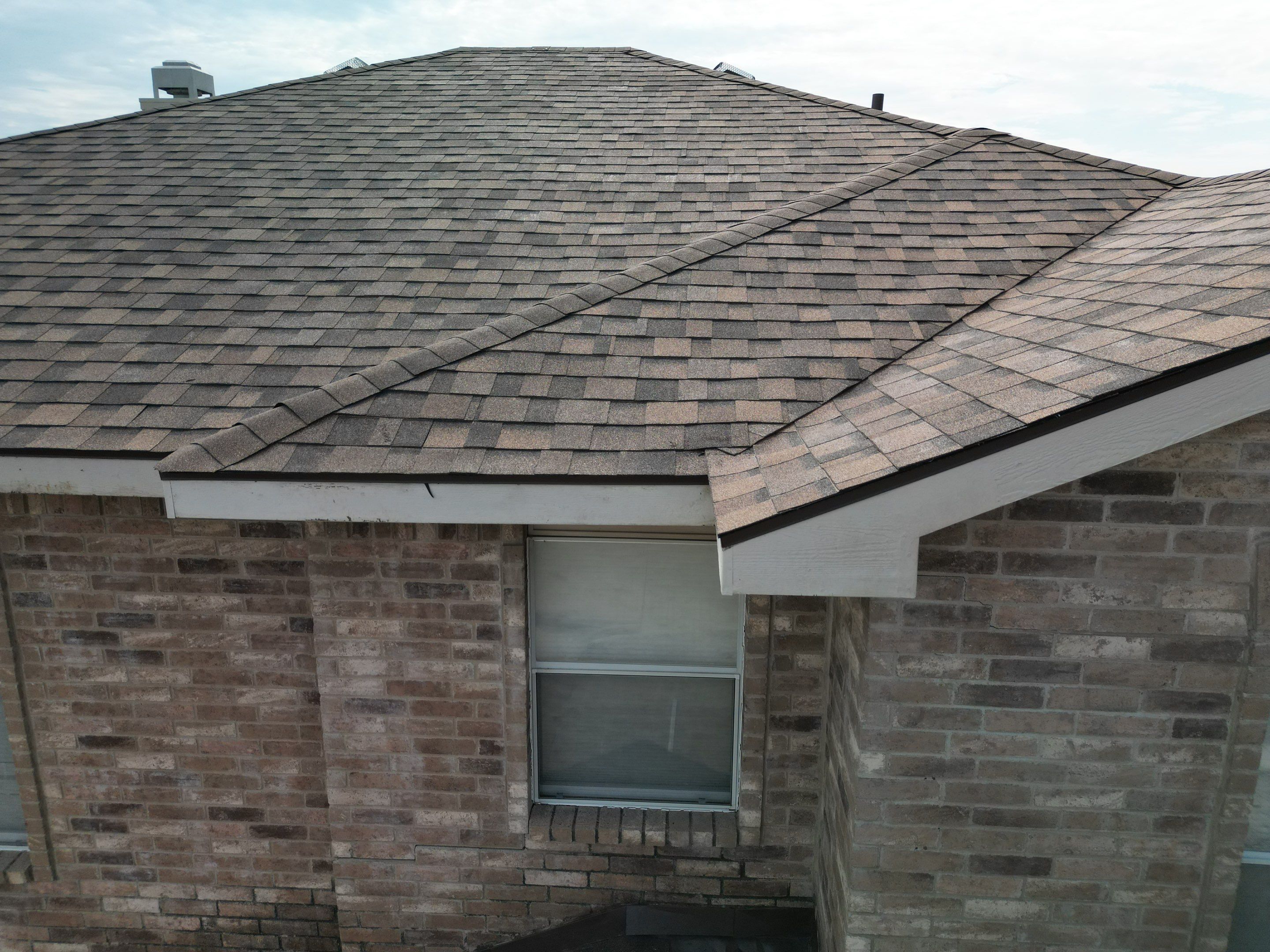 Full Roof Replacement, Chimney Rebuild and Interior Damage Replacement by First United Roofing & Construction