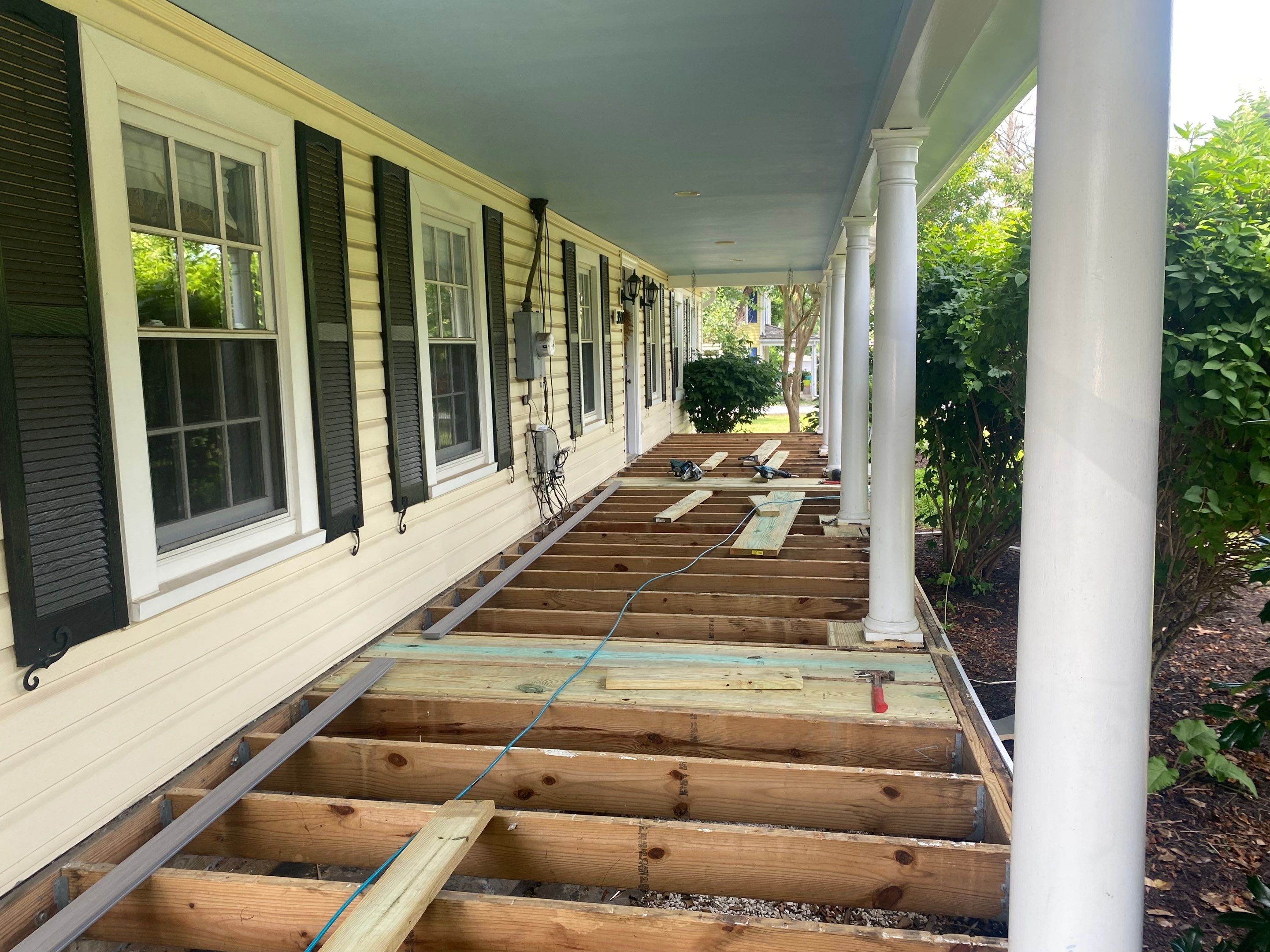 Front Porch Transformation using Timbertech Decking by The Smet Companies, LLC