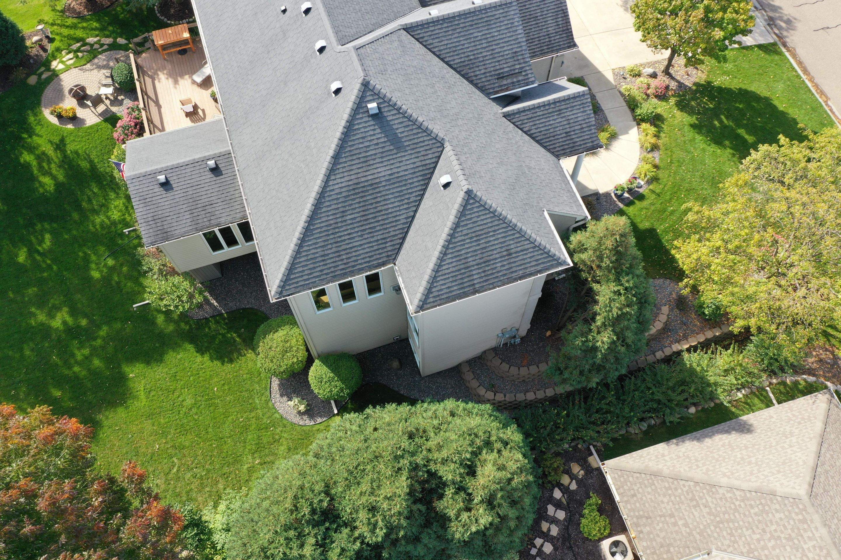 Residential Roofing Installation using Certainteed Landmark Moire Black by MODERN EXTERIOR SYSTEMS