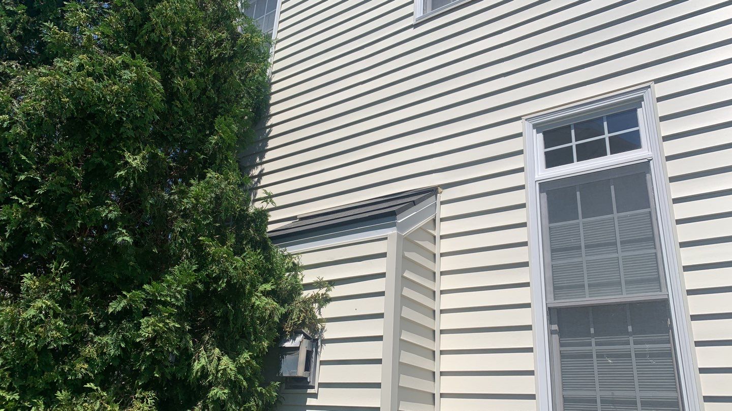 Tesla Solar Roof Replacement using Tesla Solar Roof V3 tiles by American Home Contractors