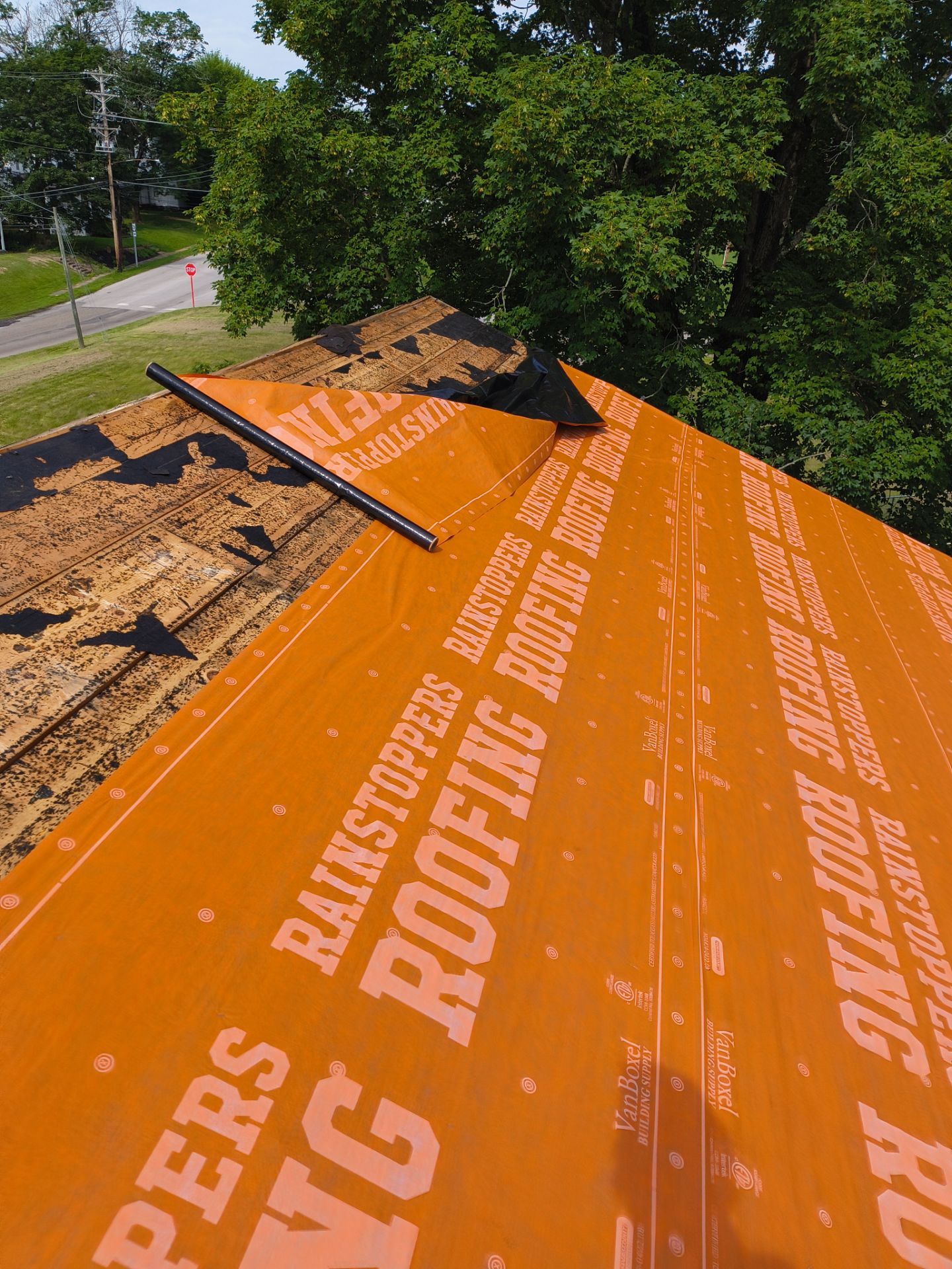 Residential Roofing Installation using GAF Timberline HDZ Oyster Grey by Rainstoppers Roofing